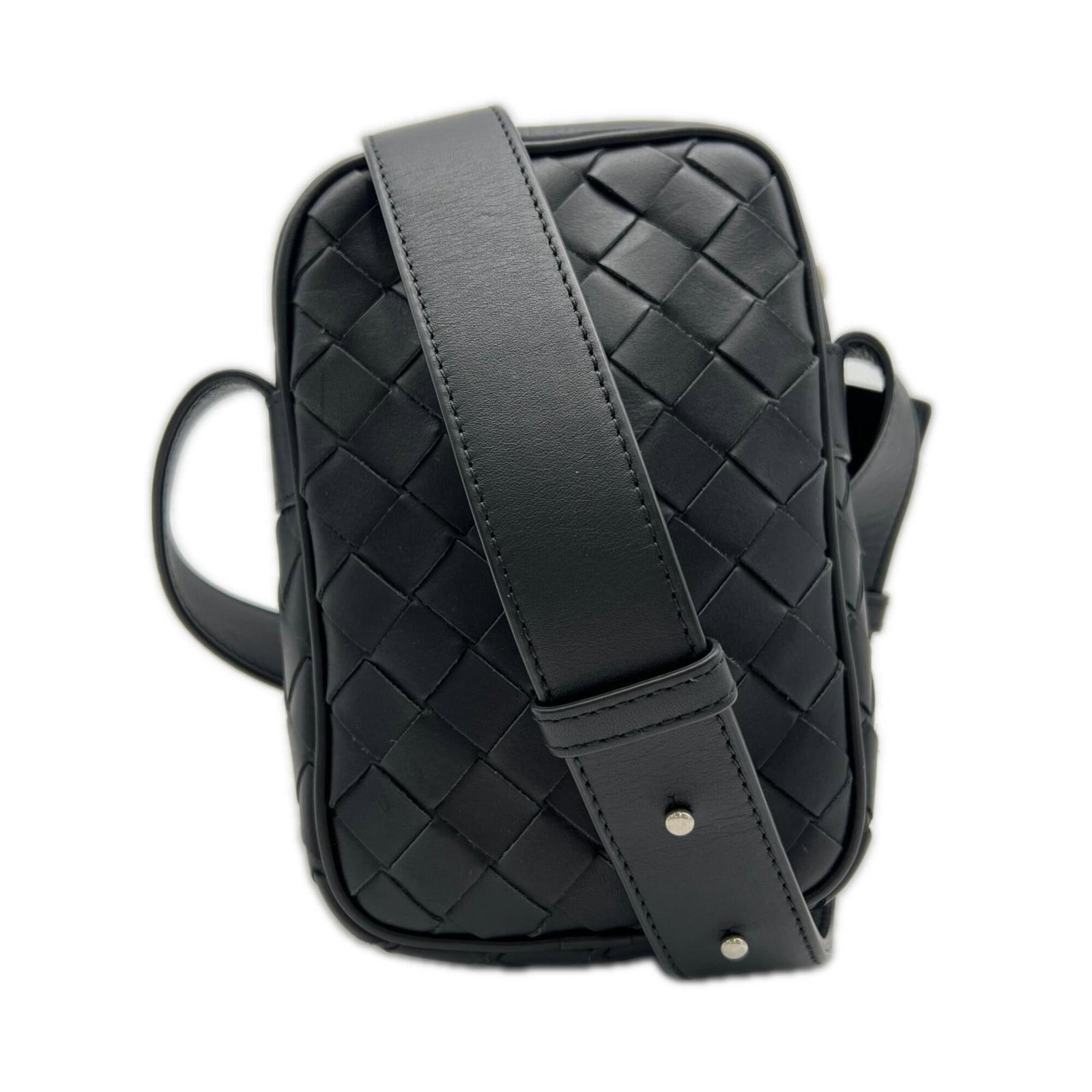 Bag Sling Leather Shoulder Bag Bottega: Bag Sling Leather Shoulder Bag Bottega Bottega Veneta's Intrecciato leather is showcased in this sleek black shoulder bag, featuring a unique sling design. The bag's calfskin material and zipper closu