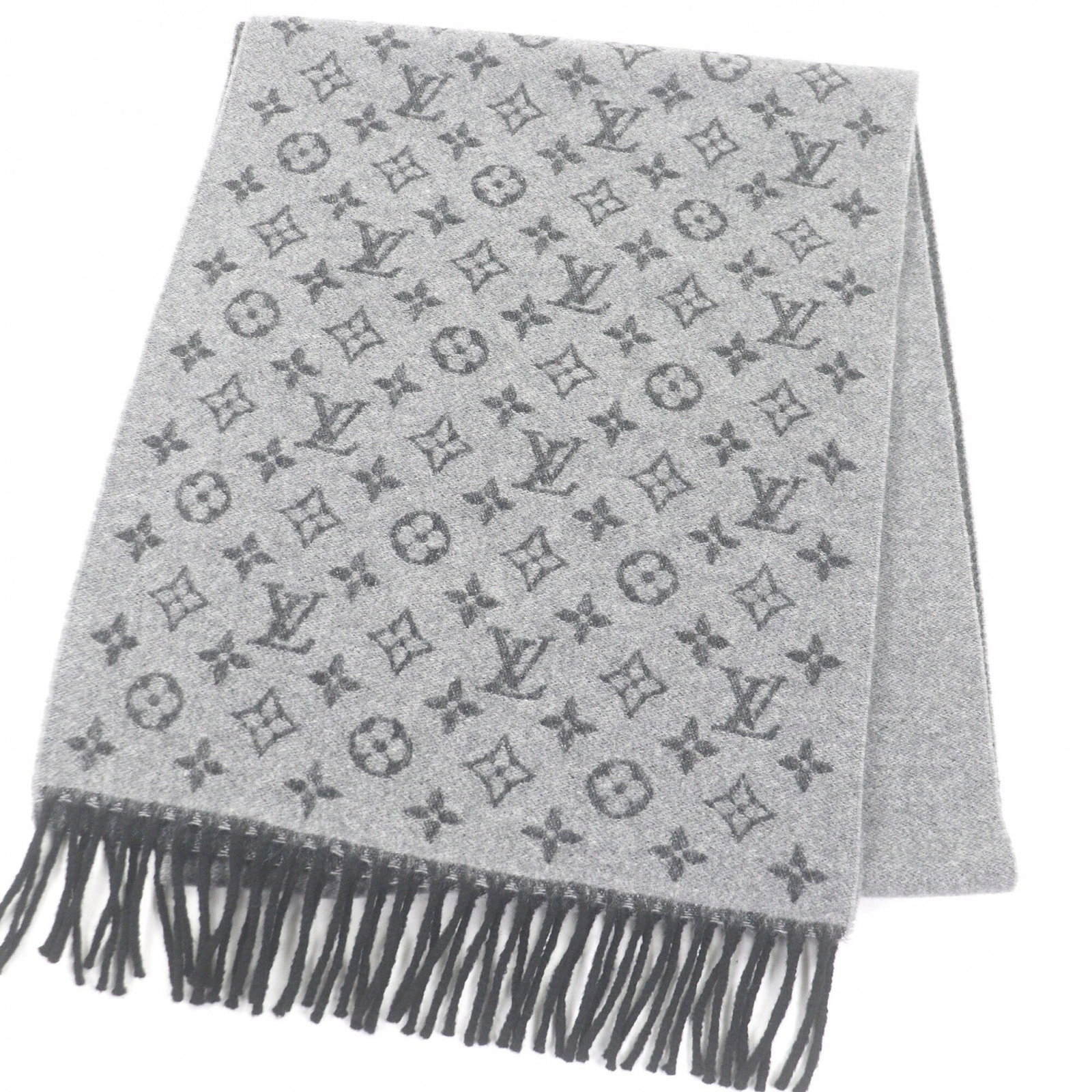 Louis Vuitton Stole Cashmere 50% Wool 50%: Louis Vuitton Stole Cashmere 50% Wool 50% The Louis Vuitton stole is a luxurious piece made from 50% cashmere and 50% wool, crafted in Italy. Measuring 1.78m x 35.5cm, it features a striking black and