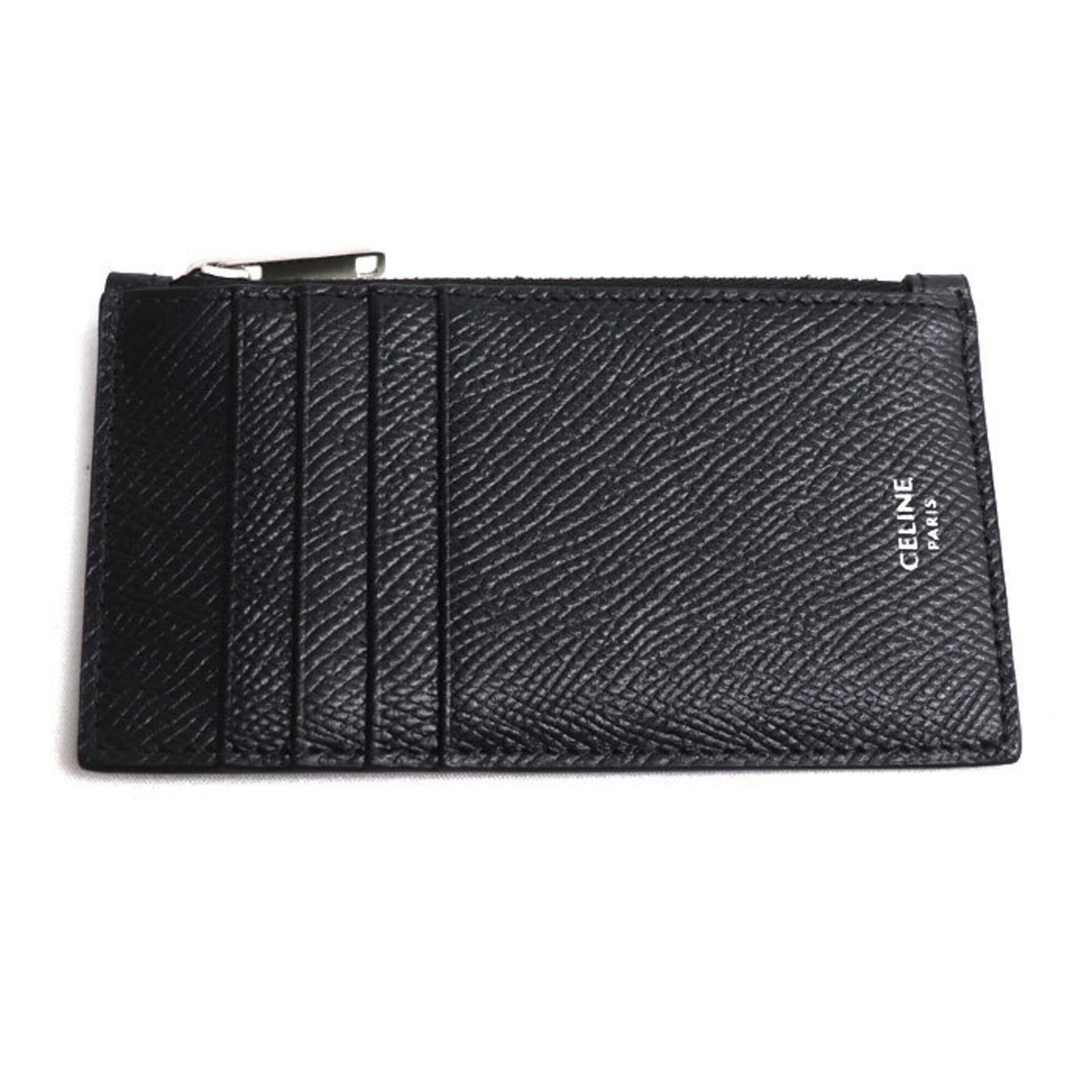 Celine Coin Purse/ Coin Case Leather: Celine Coin Purse/ Coin Case Leather Celine Coin Purse/ Coin Case Leather is made from high-quality Calfskin leather, crafted in France. The sleek black design measures 7.5cm x 13cm, making it a