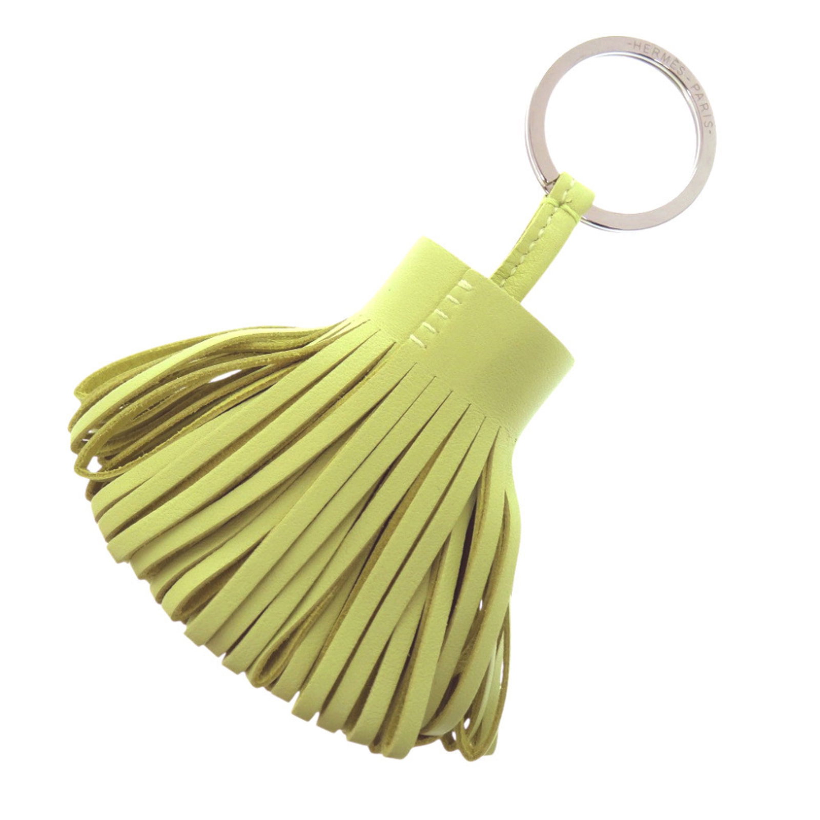 Keyring Agneau Milo Hermes: Keyring Agneau Milo Hermes Agneau Milo is a French material known for its softness and durability. This keyring features a distinctive green color and is made from Agneau Milo, a material that is