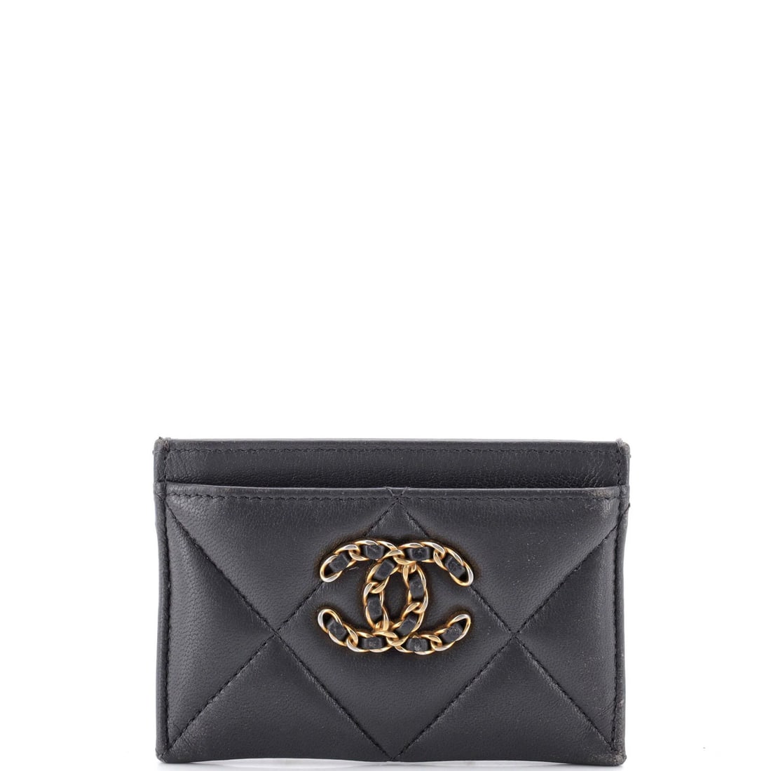 Chanel Card Quilted Leather Holder: Chanel Card Quilted Leather Holder Gray quilted leather exterior, 19 card capacity, and aged gold hardware define this Chanel card holder. The item features moderate scuffs on exterior and in
