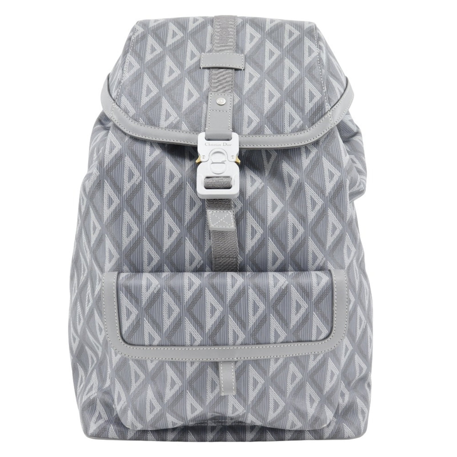 PVC Backpack Christian Dior: PVC Backpack Christian Dior PVC Backpack by Christian Dior, a stylish and modern accessory. This Italian-made backpack features a sleek gray PVC material, a snap fastener closure, and a spacious open