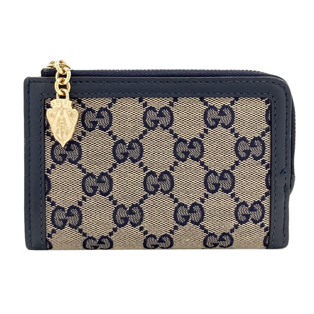 Pattern Bifold Wallet Gg Canvas With Gucci Coin 790036 Pocket: Pattern Bifold Wallet Gg Canvas With Gucci Coin 790036 Pocket Navy canvas bifold wallet with a coin pocket, designed in the classic GUCCI style, features a snap closure and a simple, understated
