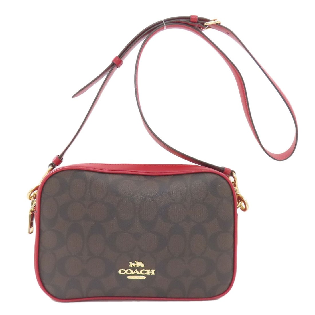 Signature Coach Pvc Bag Shoulder: Signature Coach Pvc Bag Shoulder The COACH Signature Pvc Bag Shoulder boasts a striking brown PVC exterior, making it a stylish and eye-catching accessory. This shoulder bag features a unique design t