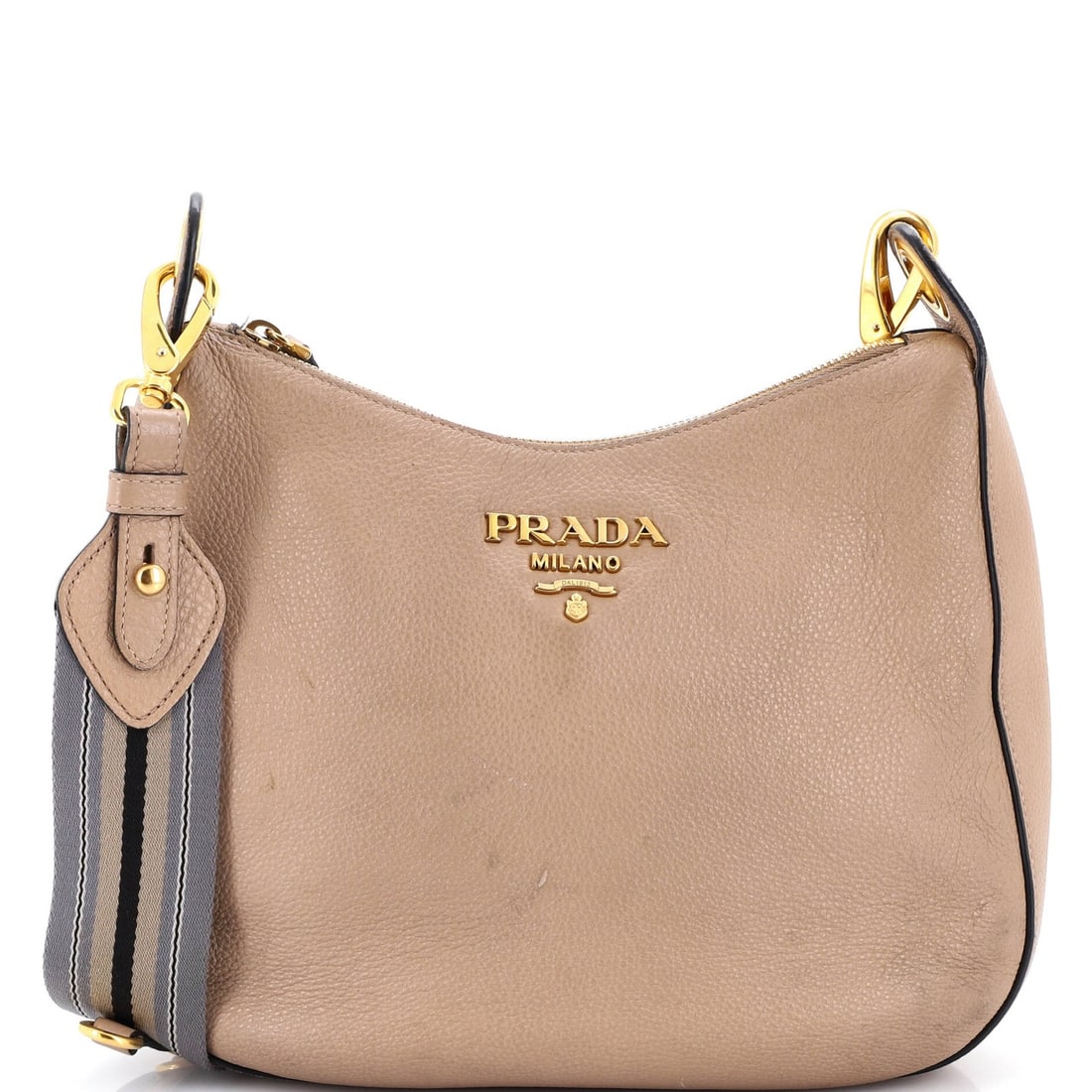 Prada Striped Strap Zip Hobo Vitello Daino Medium: Prada Striped Strap Zip Hobo Vitello Daino Medium The Prada Striped Strap Zip Hobo Vitello Daino Medium is a stylish and versatile medium-sized cross body bag featuring a neutral exterior with a