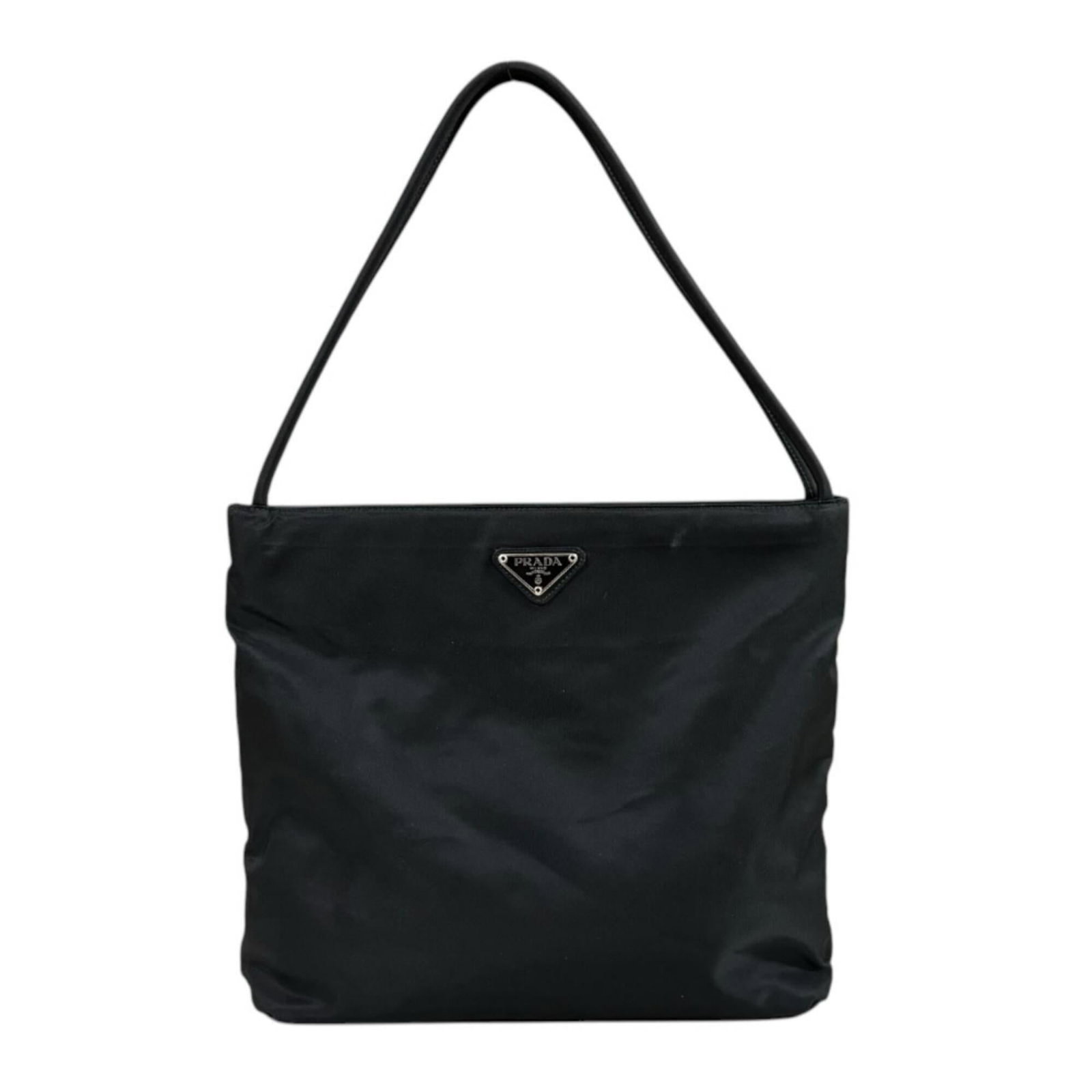 Tote Nylon Prada Handbag: Tote Nylon Prada Handbag Tote Nylon Prada Handbag. Made from high-quality nylon, this black Prada tote bag features a sleek design with an open closure. Measuring 25cm x 29cm x 8cm, it weighs 310g and