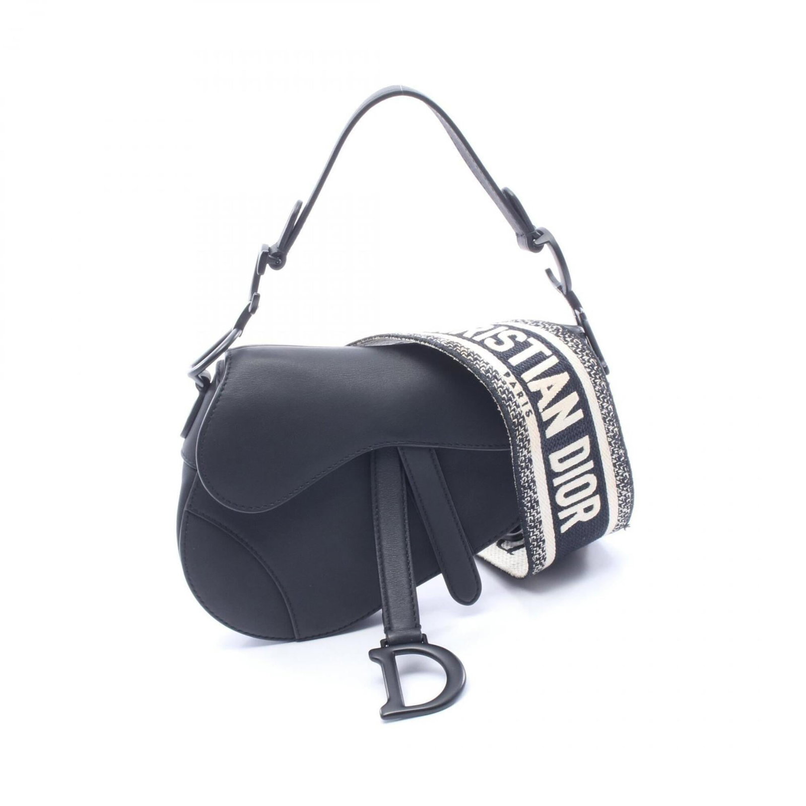 Christian Dior Leather Saddle Handbag: Christian Dior Leather Saddle Handbag Black leather saddle handbag from Christian Dior, measuring 13cm x 18cm x 6cm. This classic design features a timeless silhouette and sleek black leather
