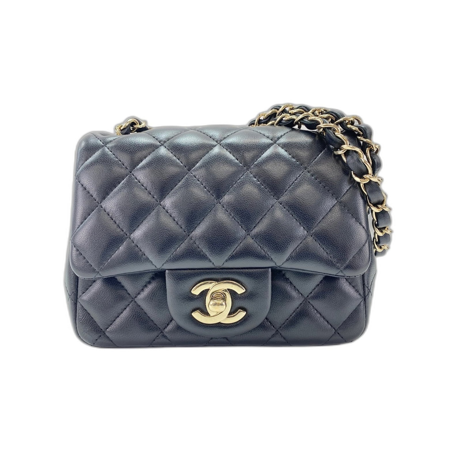 Shoulder Bag by Chanel: Shoulder Bag by Chanel This black Matelasse shoulder bag from Chanel features a sleek design with a 110cm strap length, perfect for everyday use. Measuring 12cm x 16cm x 7cm, it offers a stylish and