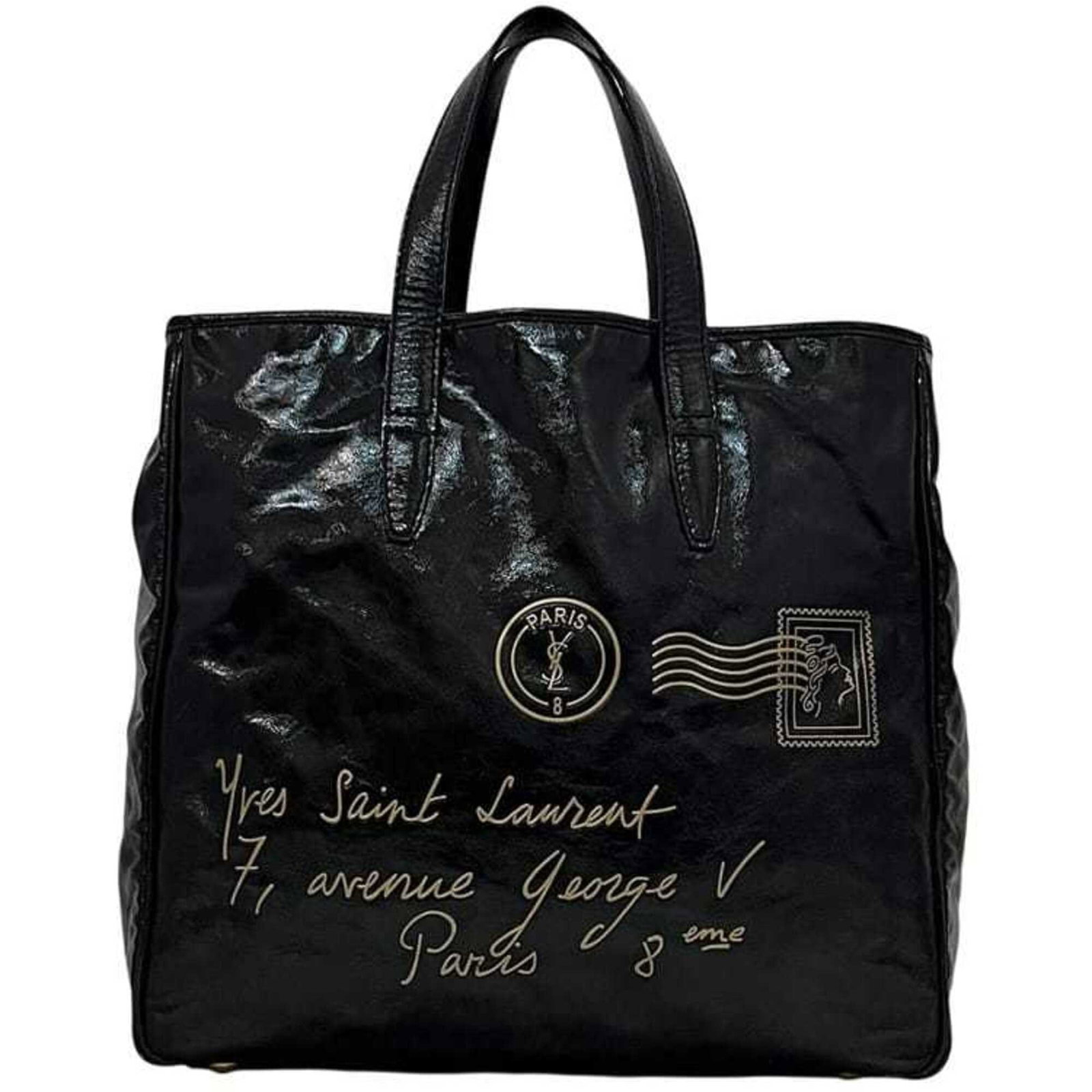Saint Laurent Tote Bag Patent Leather: Saint Laurent Tote Bag Patent Leather Patent leather tote bag from Yves Saint Laurent, featuring a sleek black design with a signature. Made from high-quality patent leather, this bag boasts a
