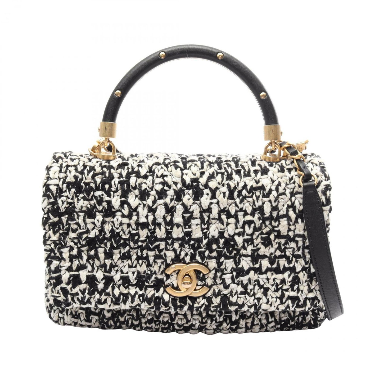 Chanel Leather Fabric Handbag: Chanel Leather Fabric Handbag Black and White Chanel Leather Fabric Handbag. This 19cm x 27cm x 10cm handbag features a striking combination of leather and fabric, with gold hardware adding a touch