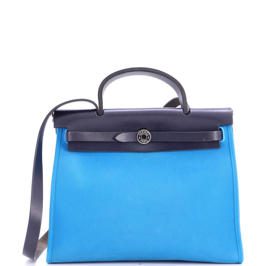 Herbag Hermes Leather Toile 31 Zip: Herbag Hermes Leather Toile 31 Zip The Herbag Hermes Leather Toile 31 Zip is a stylish shoulder bag with a blue canvas exterior and interior, featuring a palladium hardware and a pochette with a