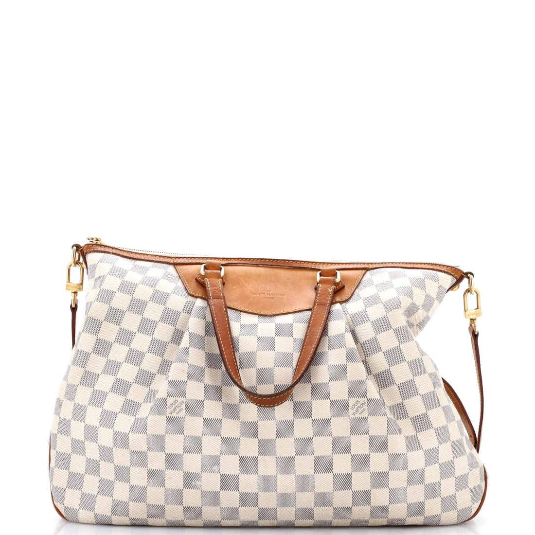 Siracusa Damier Handbag Louis Vuitton: Siracusa Damier Handbag Louis Vuitton The Siracusa Damier Handbag from Louis Vuitton features a classic canvas coated design in white, with a neutral interior and gold hardware. This shoulder bag