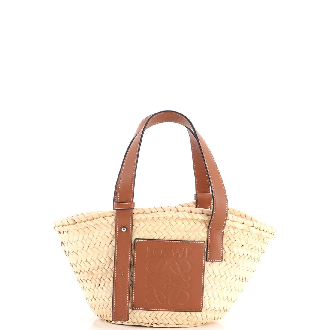 Loewe Raffia Small Basket Tote: Loewe Raffia Small Basket Tote Raffia Small Basket Tote from Loewe, boasting a neutral exterior with minor scuffs and a classic design. This small tote features a 7"-7.5" handle drop and measures 7"