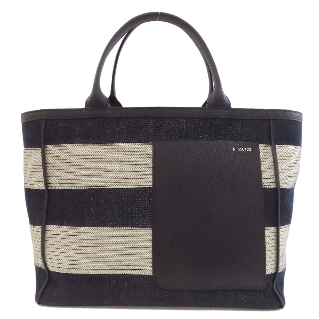 Valextra Border Tote Bag Canvas: Valextra Border Tote Bag Canvas Navy canvas tote bag with a classic border design, showcasing a timeless and versatile style. Made from high-quality canvas, this tote bag is a practical and stylish ac