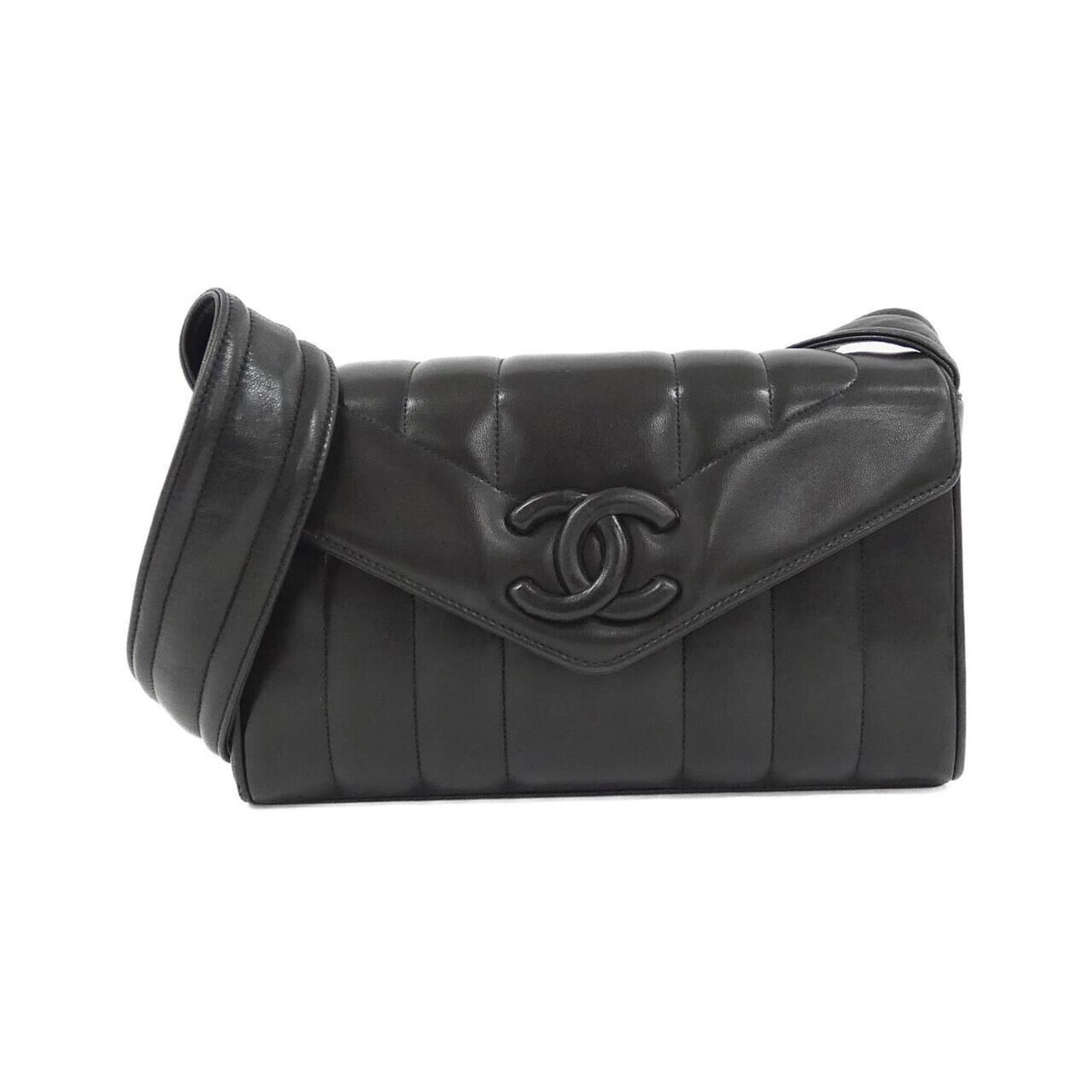 Shoulder Bag Leather Chanel: Shoulder Bag Leather Chanel This black shoulder bag is made from high-quality lamb leather, a distinctive material choice for Chanel. Its sleek design and compact size make it a stylish and practical 
