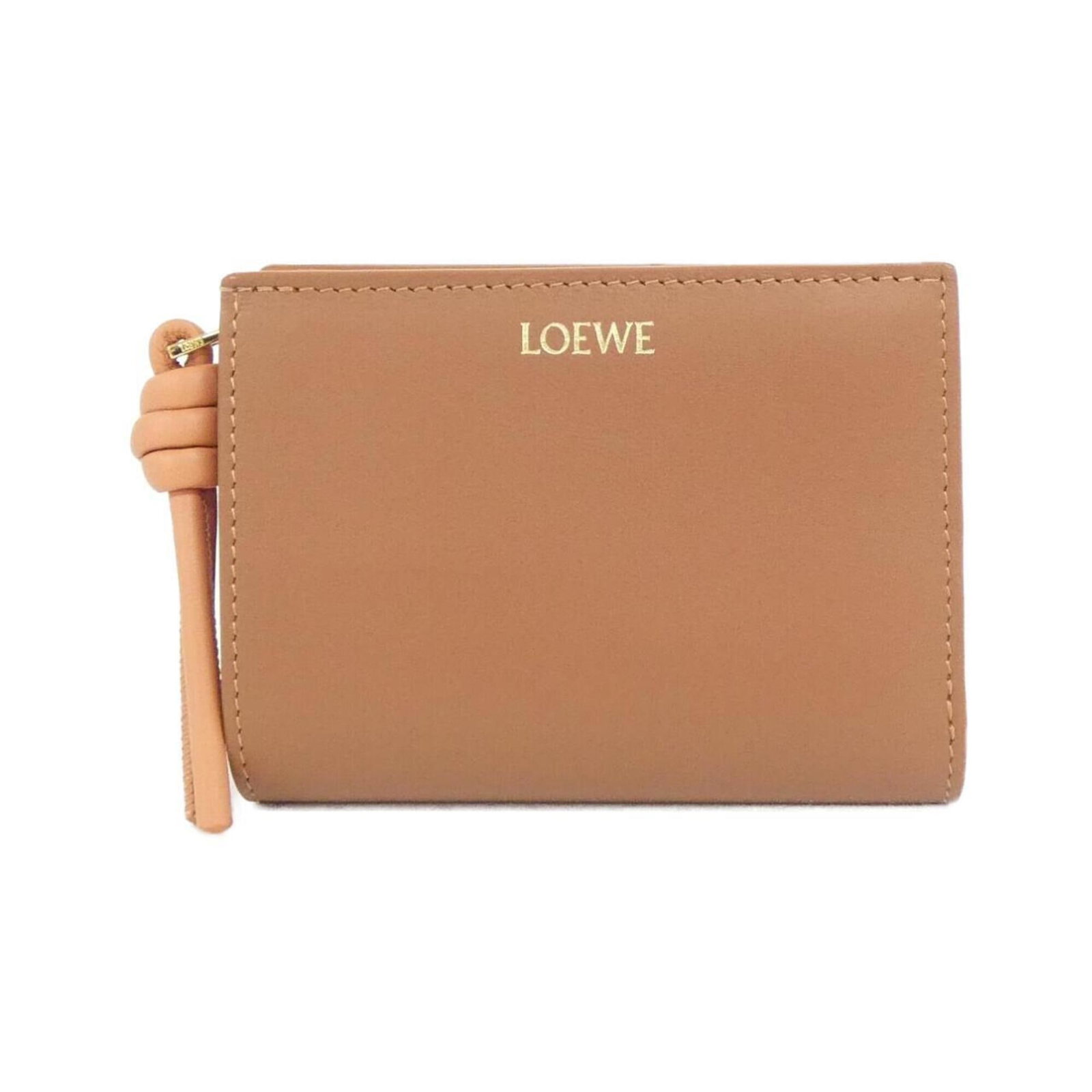 Loewe Wallet (Tri-Fold) Leather: Loewe Wallet (Tri-Fold) Leather Tri-fold leather wallet from renowned brand Loewe, boasting classic design and premium leather construction. Measuring 9cm x 12cm x 3cm, this stylish accessory is