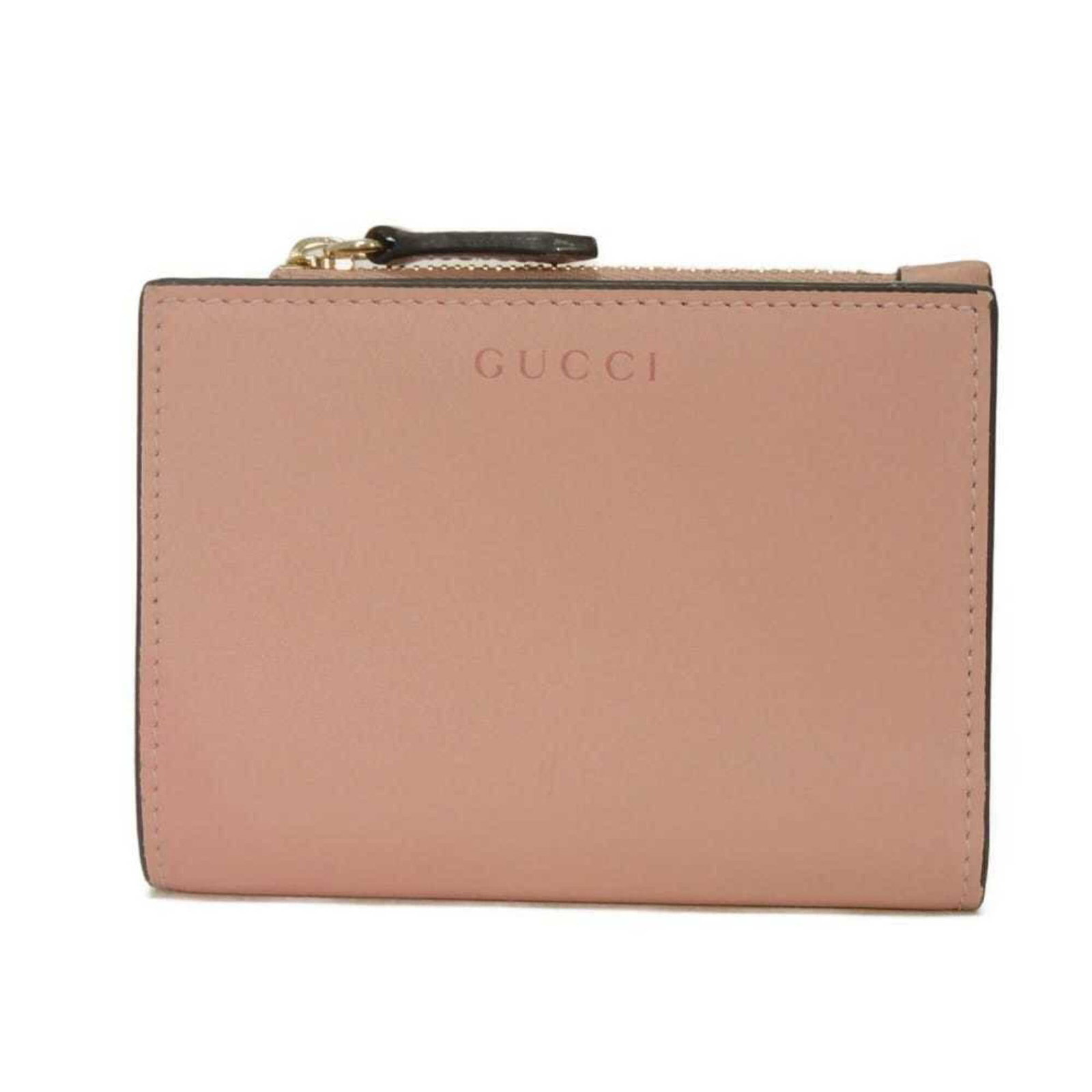 Gucci Wallet (Bi-Fold) Leather: Gucci Wallet (Bi-Fold) Leather Dusty pink leather Gucci bi-fold wallet with a classic design. Made from high-quality leather, this wallet features a sleek and stylish design that is both functional