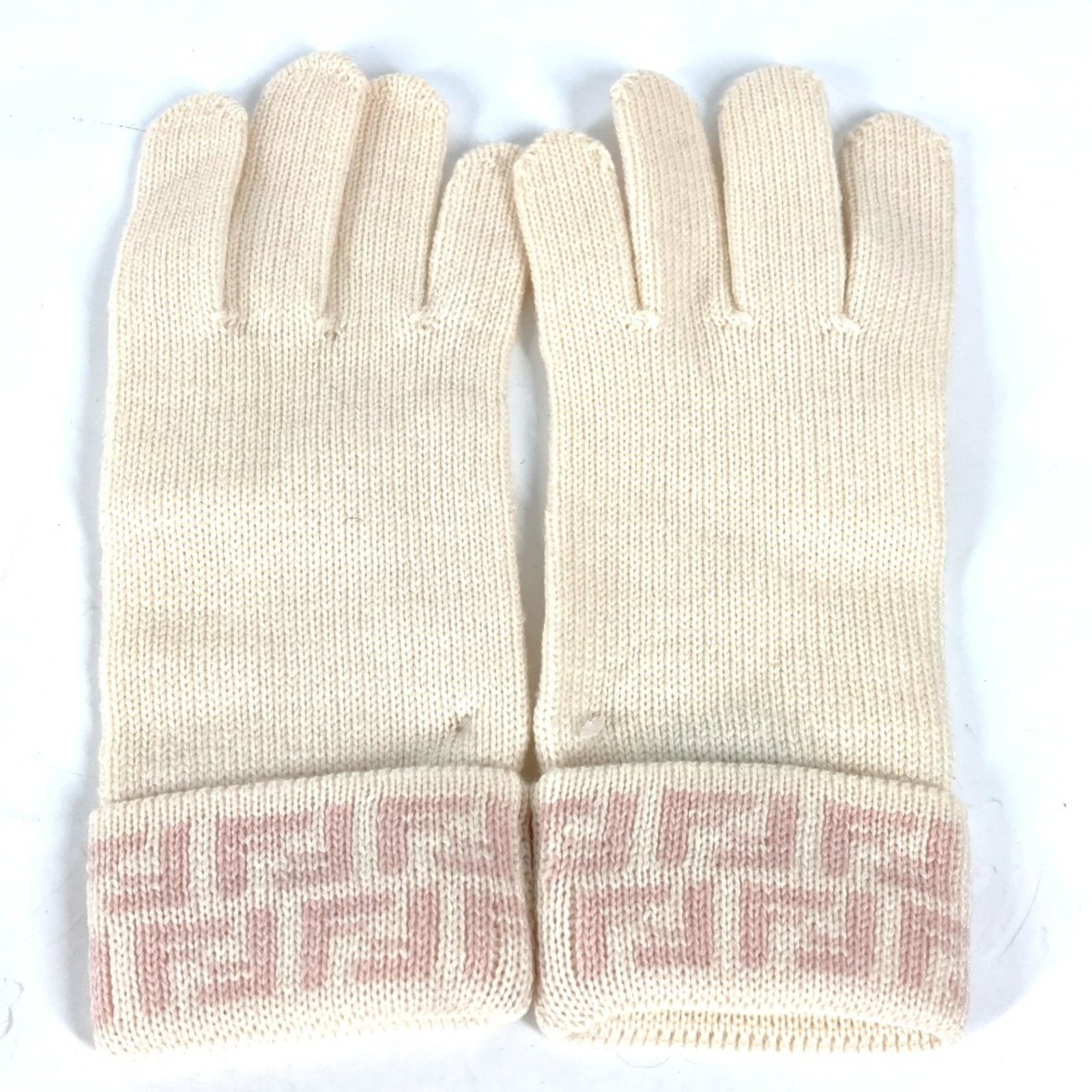 Fendi Gloves Wool Short: Fendi Gloves Wool Short Beige or Pink Wool Short Gloves from Fendi, measuring 22cm in length, made from high-quality wool material. These short gloves are a stylish accessory, adding a touch of