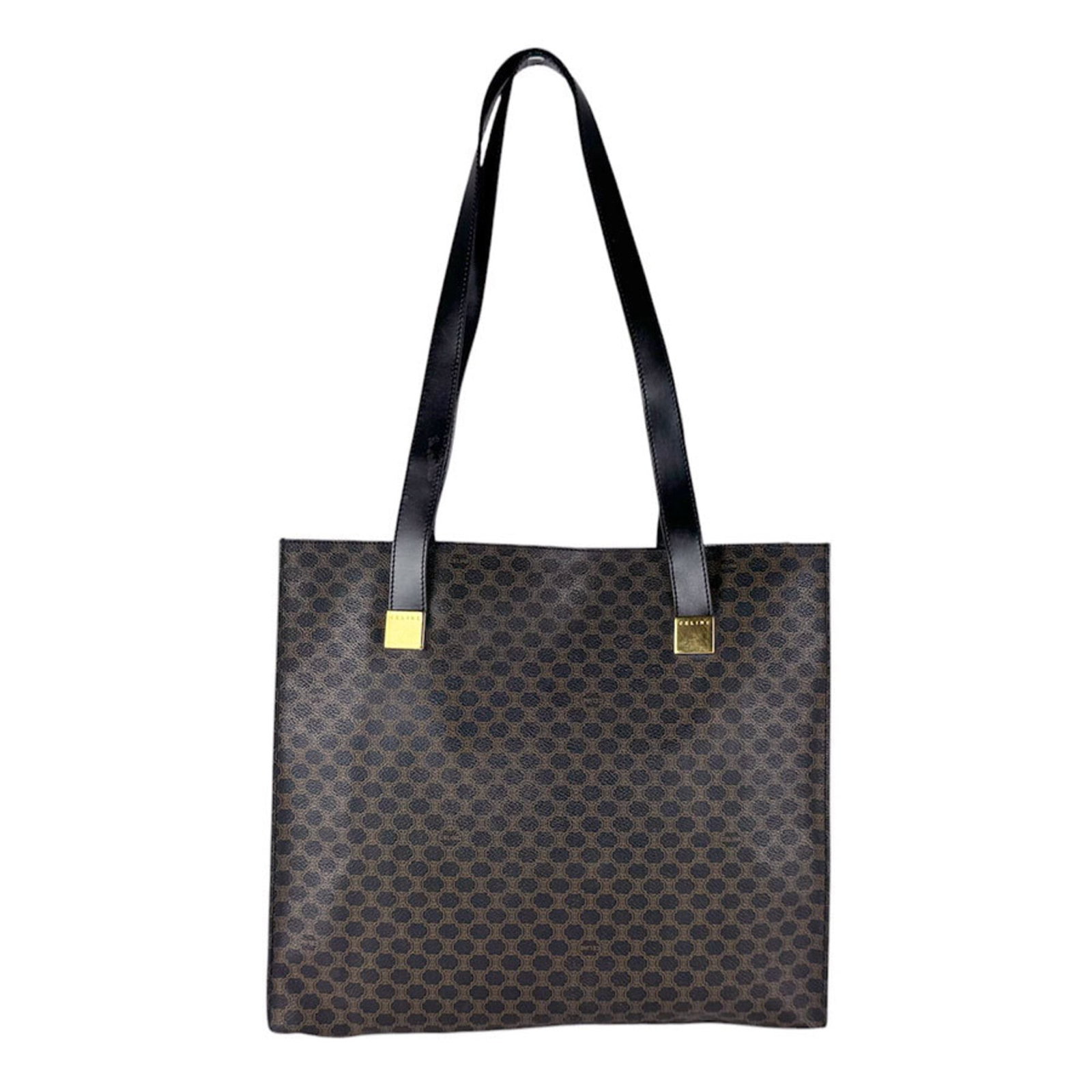 Canvas Tote Bag Coated Celine: Canvas Tote Bag Coated Celine Coated canvas construction gives this Celine tote bag a durable and water-resistant finish. Black and brown color options are available, with a size that fits