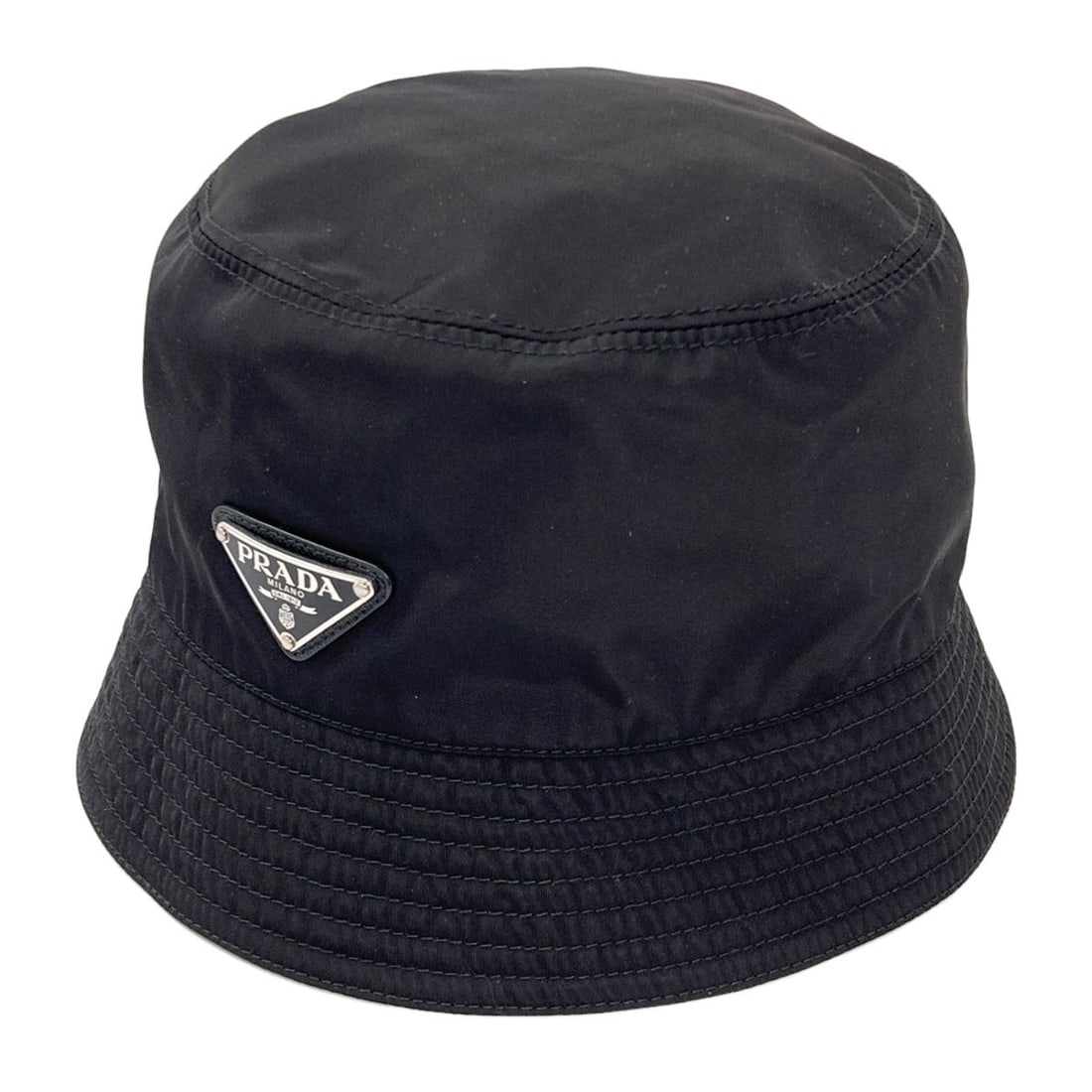 Logo Prada Bucket Hat Nylon Hardware: Logo Prada Bucket Hat Nylon Hardware Black Prada nylon bucket hat with logo and hardware details. Made from nylon, this hat features a black exterior with a prominent logo and hardware accents. Item
