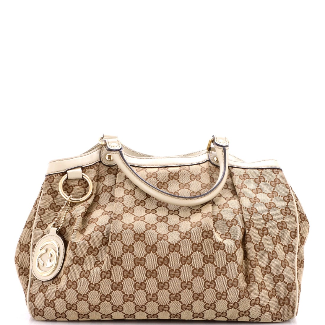Canvas GG Tote Leather Medium Gucci Sukey: Canvas GG Tote Leather Medium Gucci Sukey Canvas GG Tote Leather Medium Gucci Sukey. This medium-sized Gucci Sukey tote features a canvas exterior with leather accents, with a neutral brown color and 