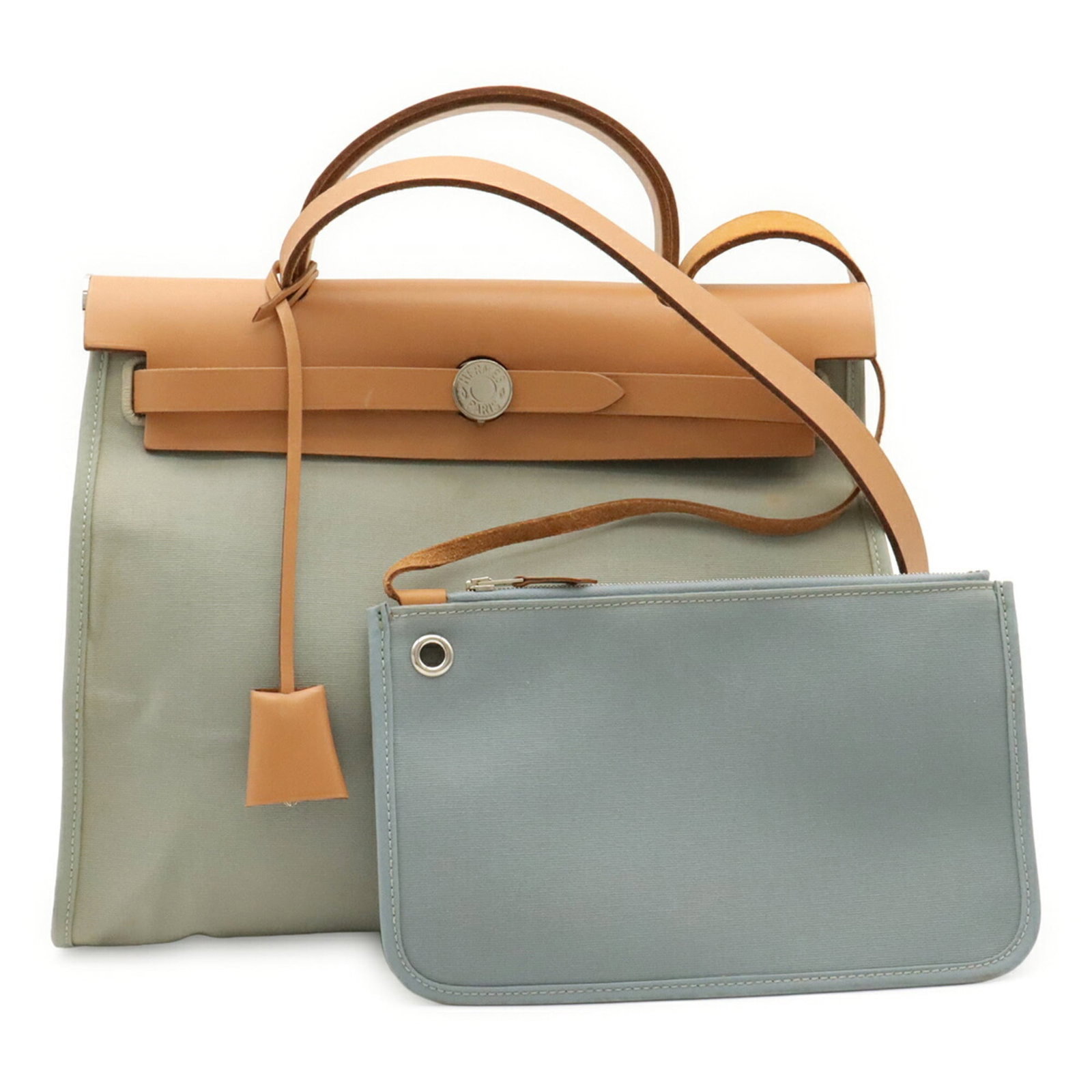 Hermes Handbag Pouch Shoulder Officier Toile: Hermes Handbag Pouch Shoulder Officier Toile The Hermes Handbag Pouch Shoulder Officier Toile is a unique and stylish accessory, featuring the iconic Toile officier design in a beautiful Ciel, Mint