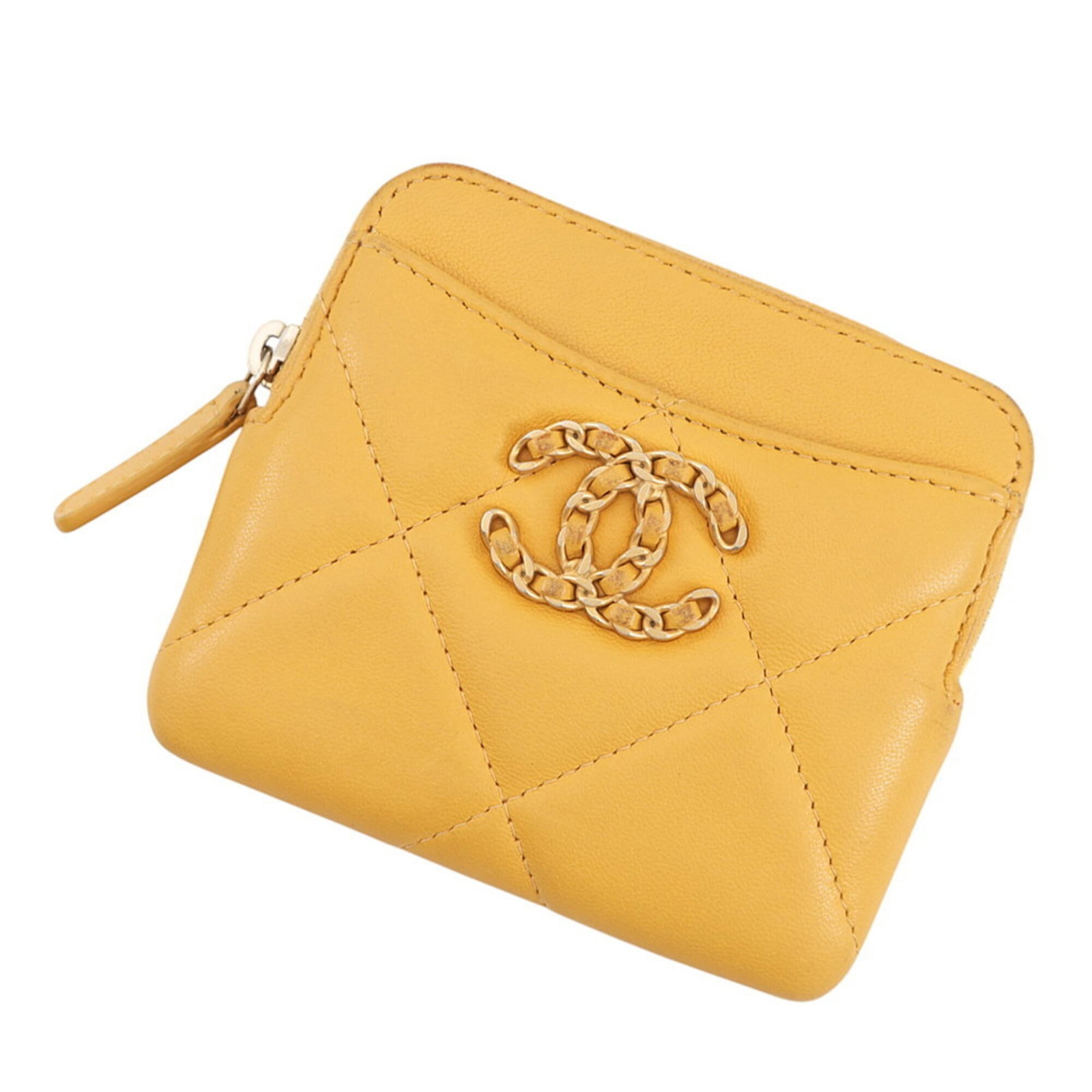 Coin purse in leather case: Coin purse in leather case This yellow lambskin leather coin purse is crafted in Italy, featuring a classic design. Made from high-quality lambskin, it measures 9.5cm x 11cm and offers a stylish way