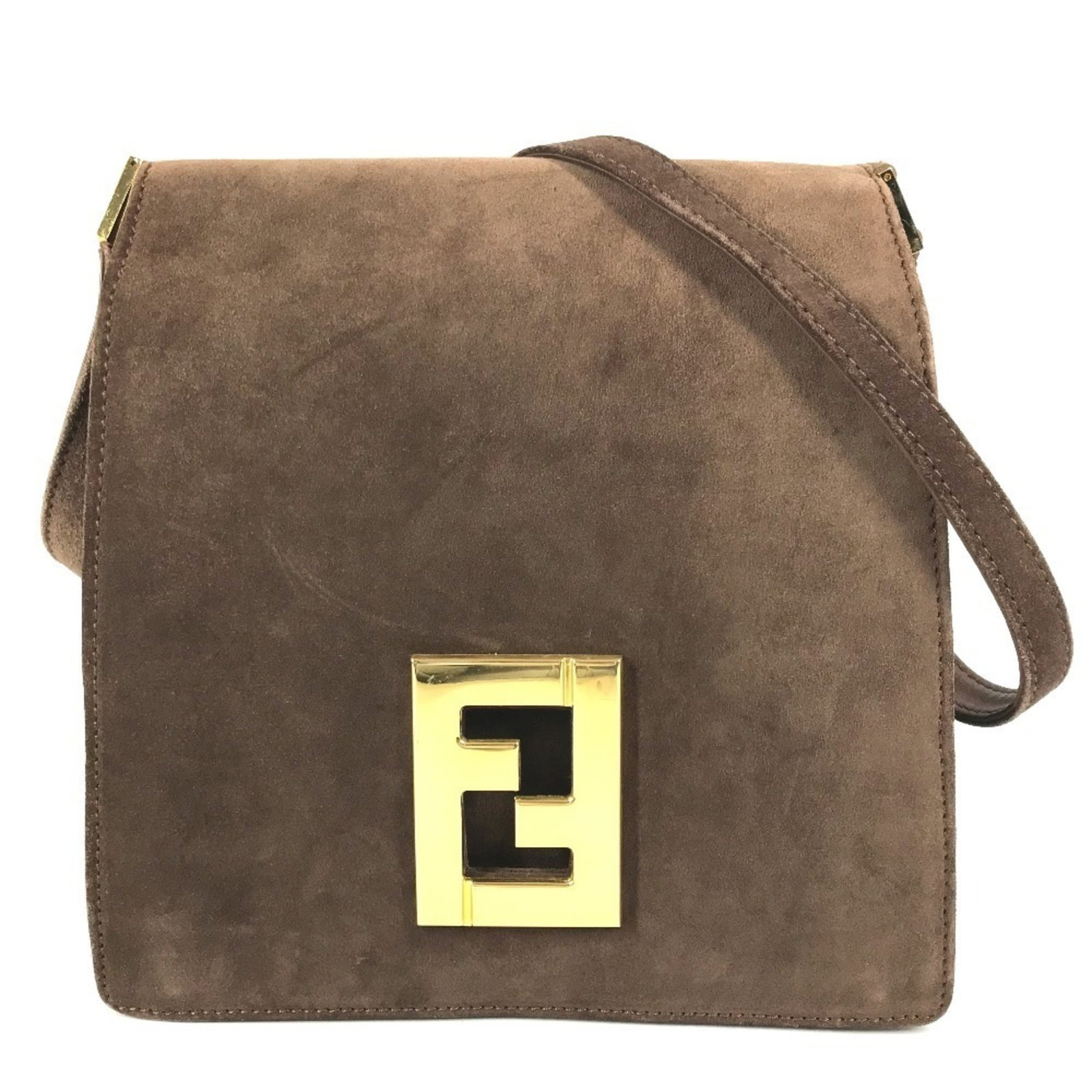 Fendi Suede Shoulder Bag: Fendi Suede Shoulder Bag Suede perfection in a timeless design, this Fendi shoulder bag boasts rich brown suede material and sleek dimensions, measuring 28.5cm x 23.5cm x 2cm. Its classic style makes