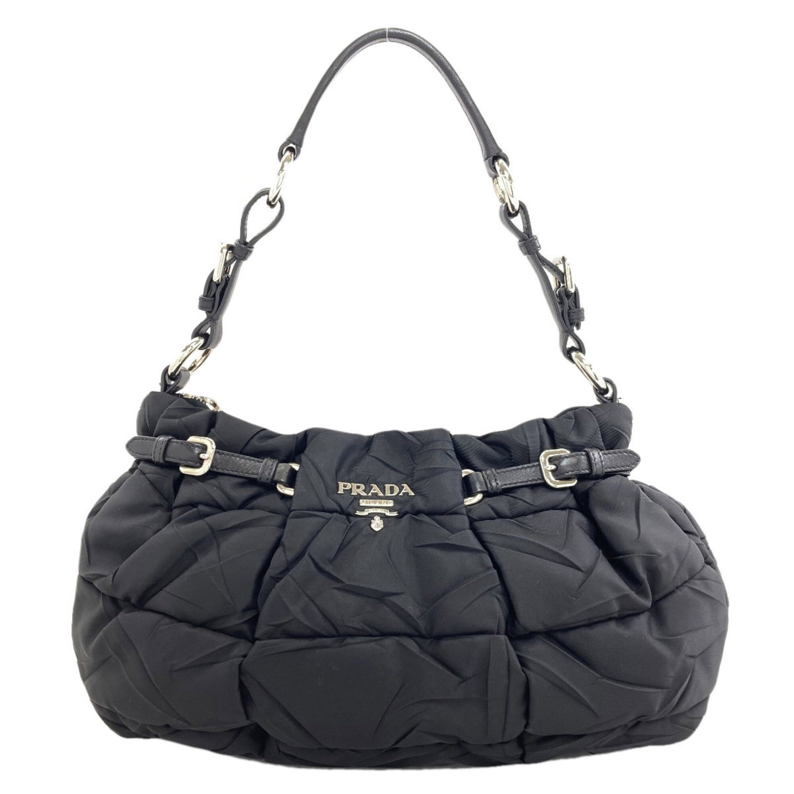 Nylon Prada Handbag: Nylon Prada Handbag Black nylon Prada handbag with dimensions 20cm x 29cm x 14cm, perfect for everyday use. The bag's nylon material provides a durable and versatile design, while its sleek black colo