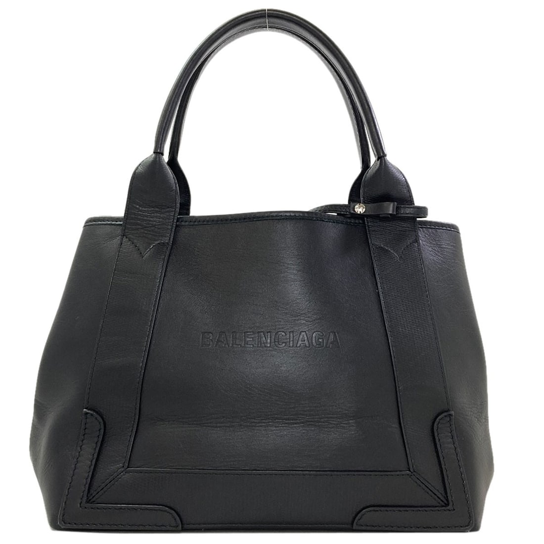 Balenciaga 339933 Navy Cabas Handbag Calf: Balenciaga 339933 Navy Cabas Handbag Calf Navy blue Balenciaga 339933 Cabas handbag with a sleek, open design and structured shape. Made from high-quality calf leather, the bag features a classic