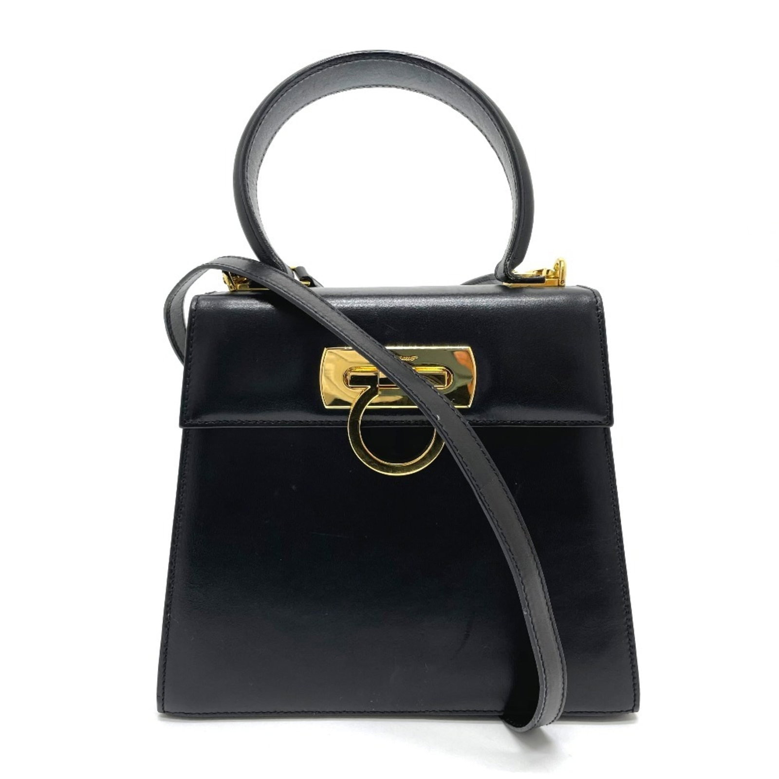 Ferragamo Leather Shoulder Bag: Ferragamo Leather Shoulder Bag Ferragamo Leather Shoulder Bag - Black. This sleek shoulder bag features high-quality leather construction, with a timeless design that exudes sophistication. Measuring 
