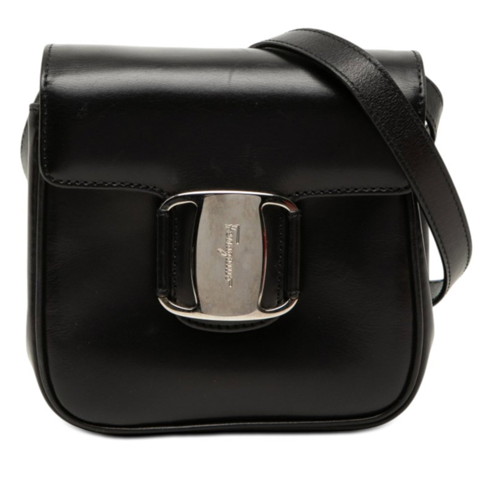Ferragamo Leather Shoulder Bag: Ferragamo Leather Shoulder Bag Black leather shoulder bag with a magnet closure, measuring 13cm x 13cm x 5cm. Features a sleek design with a 60.5cm strap drop, perfect for everyday use. Made from