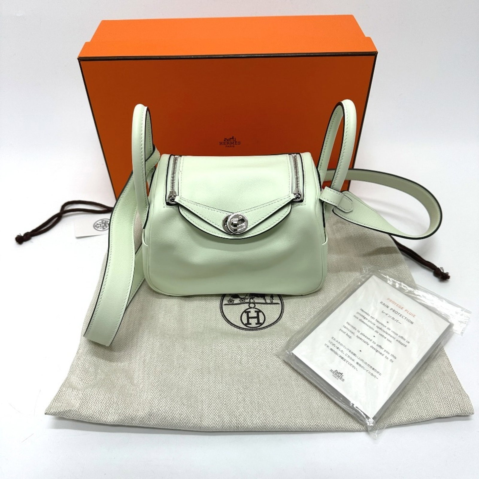 Swift Leather Shoulder Bag Hermes: Swift Leather Shoulder Bag Hermes Swift Leather Shoulder Bag by Hermes. This light green Swift leather shoulder bag features a compact size and durable design, making it a practical and stylish