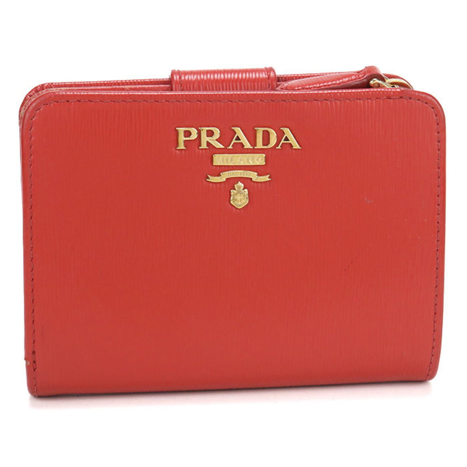 Bi fold leather wallet: Bi fold leather wallet Red leather bi-fold wallet from Prada, measuring 9cm x 12cm x 3.5cm, features a classic design with a bold red color. Made from high-quality leather, this wallet is a stylish