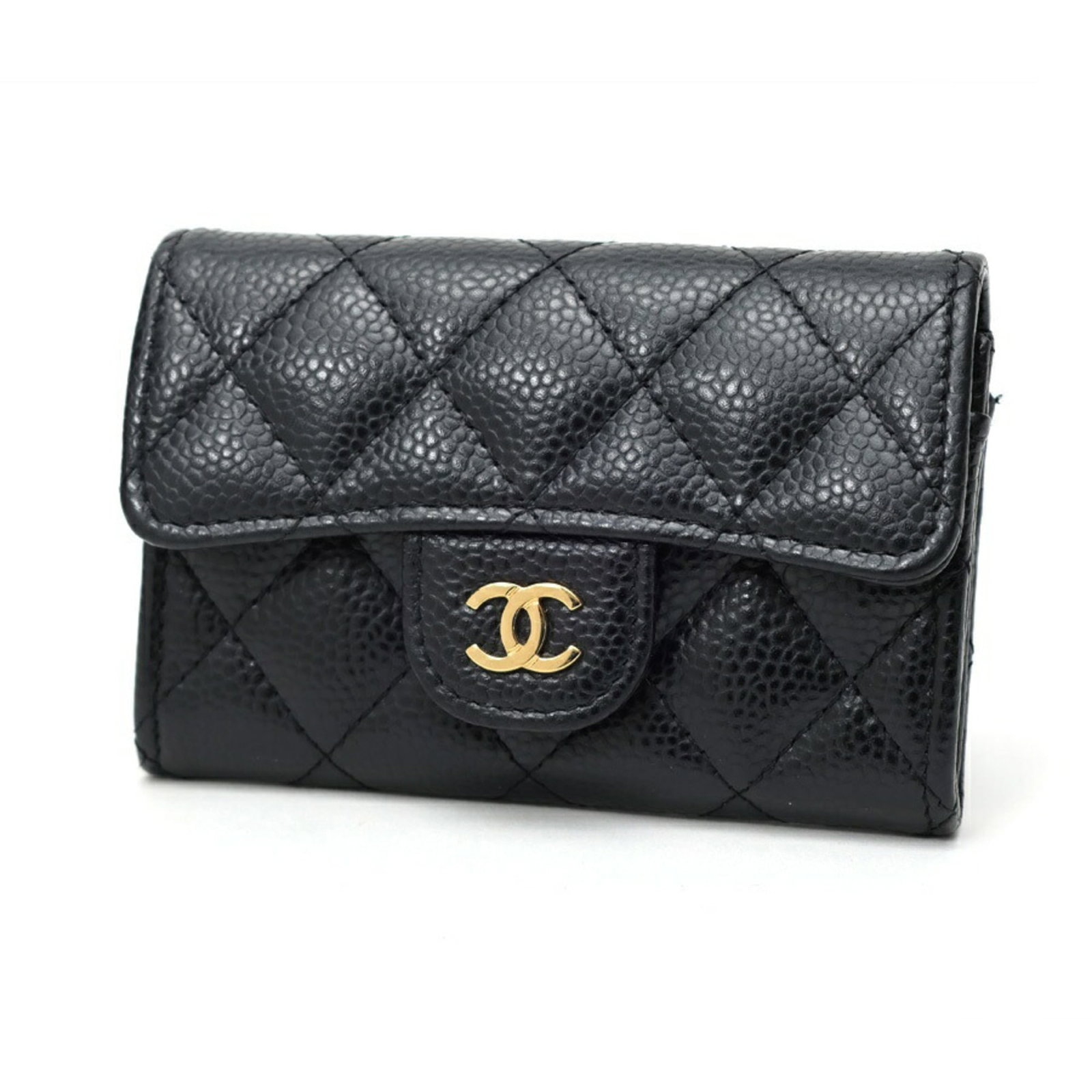 Coin Case Grained Calfskin by Chanel: Coin Case Grained Calfskin by Chanel Grained Calfskin Coin Case by Chanel. Made from high-quality grained calfskin, this sleek coin case boasts a sophisticated black finish. Perfectly sized for