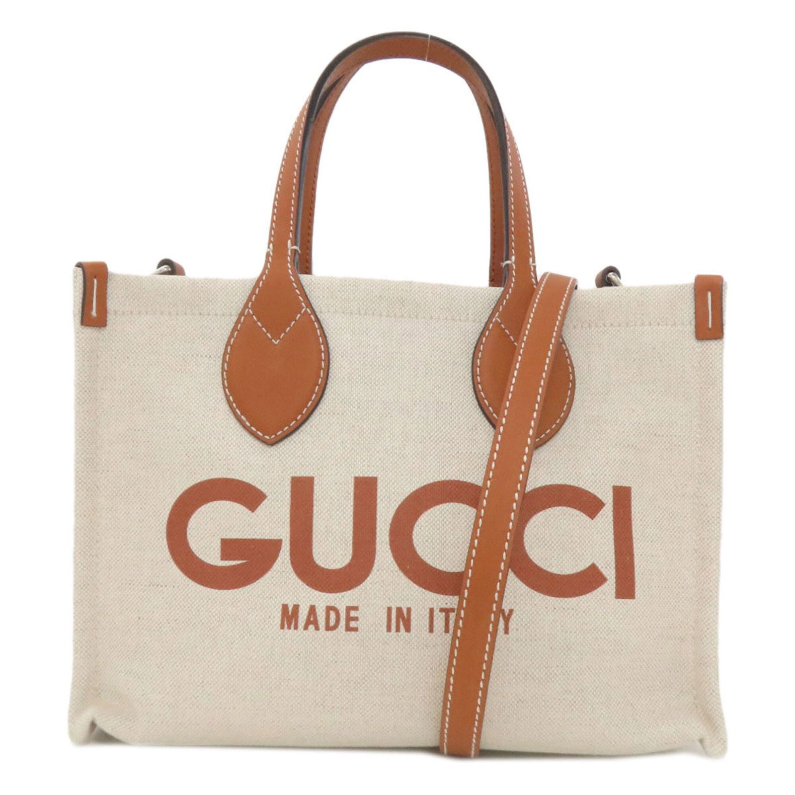 Handbag Pouch Canvas Gucci: Handbag Pouch Canvas Gucci Canvas Gucci handbag pouch in beige and brown, measuring 19cm x 27.5cm x 12cm. This canvas pouch features a classic design with a signature on the front, adding a touch of