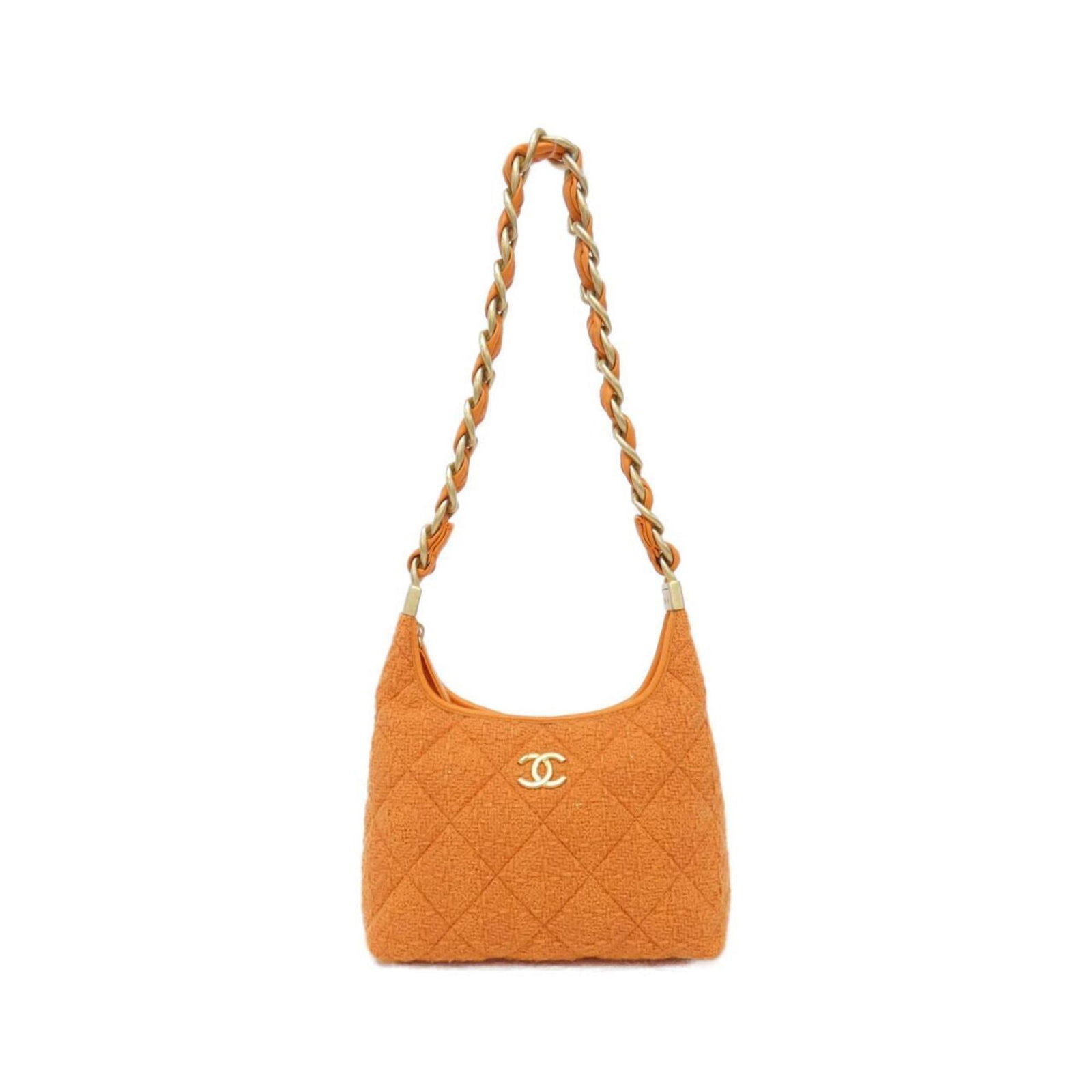 Shoulder Bag Wool Tweed By Chanel: Shoulder Bag Wool Tweed By Chanel This vibrant orange wool tweed shoulder bag from Chanel boasts a unique and stylish design. Measuring 22cm x 19.5cm x 8.5cm, it offers a compact and portable