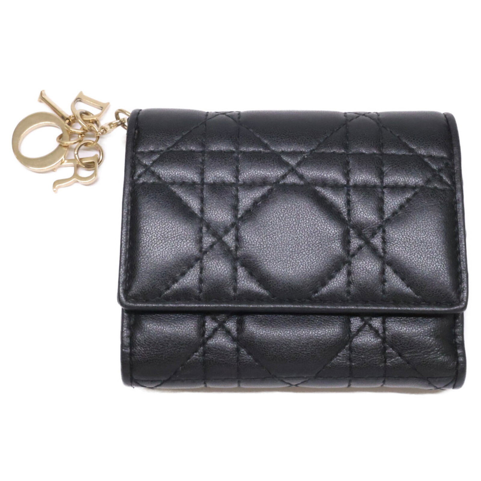 Christian Dior Wallet (Tri-Fold) Leather: Christian Dior Wallet (Tri-Fold) Leather Tri-fold leather wallet from Christian Dior, crafted from high-quality lambskin. Measuring 8.5cm x 10cm x 3cm, this sleek wallet features a classic design with