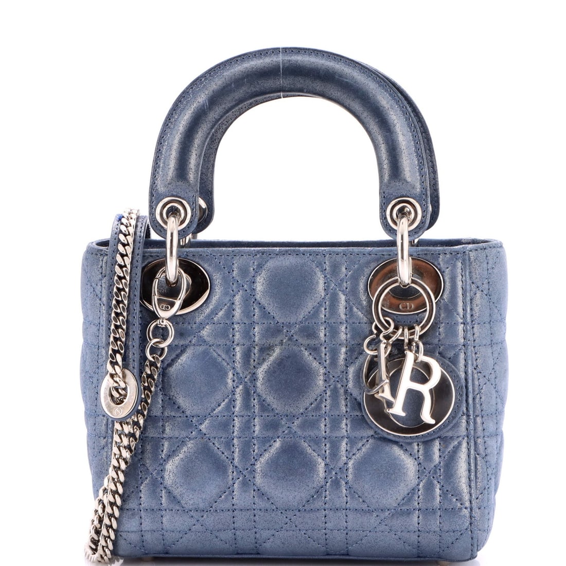 Lady Dior Chain Bag Cannage Quilt Leather Iridescent Mini Christian Dior: Lady Dior Chain Bag Cannage Quilt Leather Iridescent Mini Christian Dior The Lady Dior Chain Bag Cannage Quilt Leather Iridescent Mini is a stunning, miniature version of the iconic Christian Dior des
