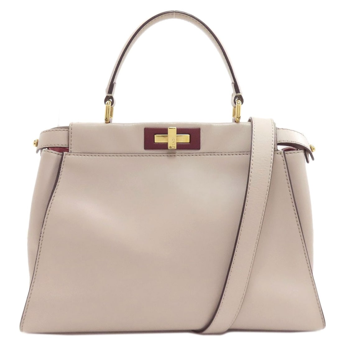 Handbag Calf Peekaboo 2Way Fendi: Handbag Calf Peekaboo 2Way Fendi Calf Peekaboo 2Way Fendi, a stylish handbag in gray, features a calf exterior material. This iconic design, known for its Peekaboo 2Way closure, is a classic Fendi