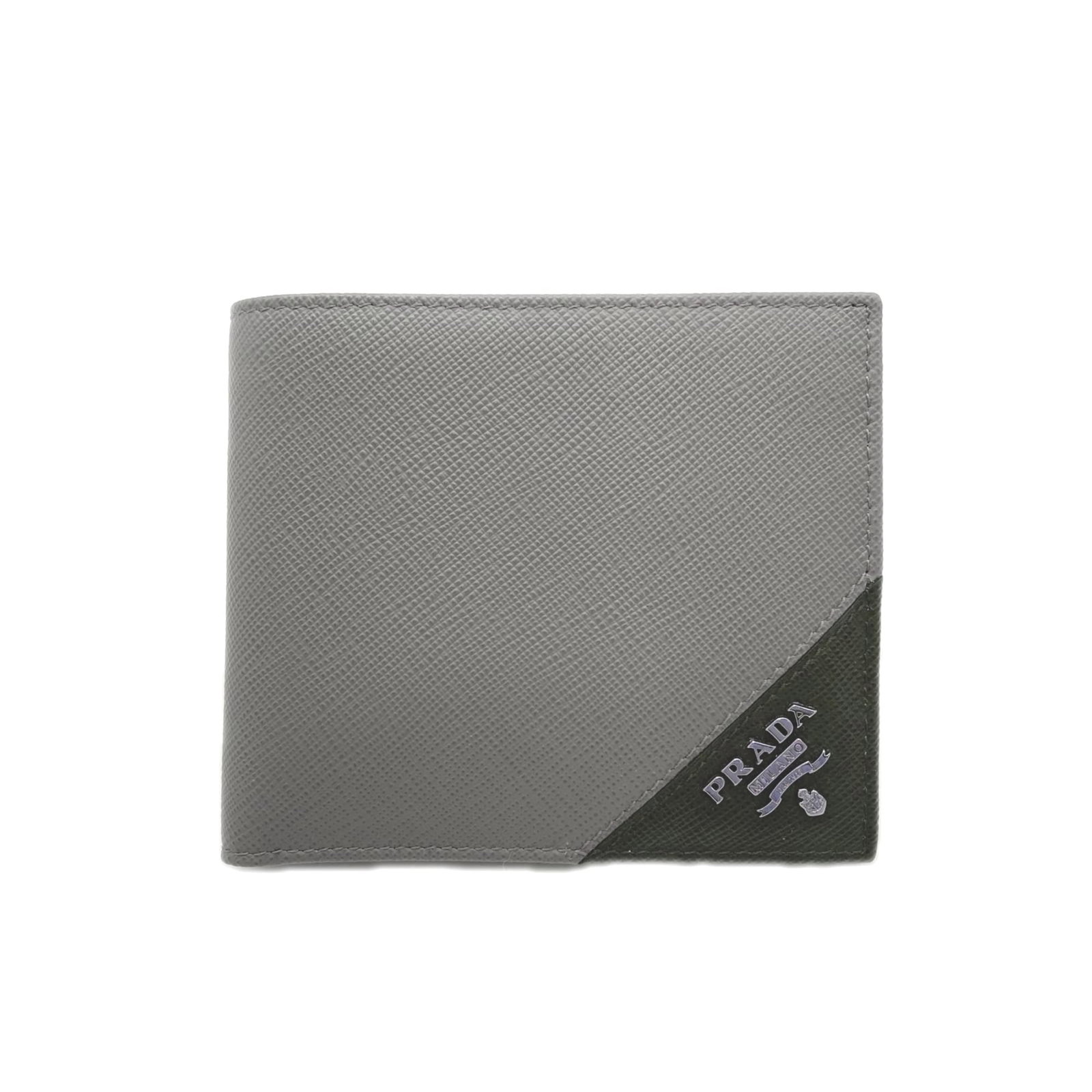 Prada Wallet (Bi-Fold) Saffiano: Prada Wallet (Bi-Fold) Saffiano Saffiano leather construction provides durability and resistance to wear. The bi-fold design allows for easy organization and accessibility of essential items. A