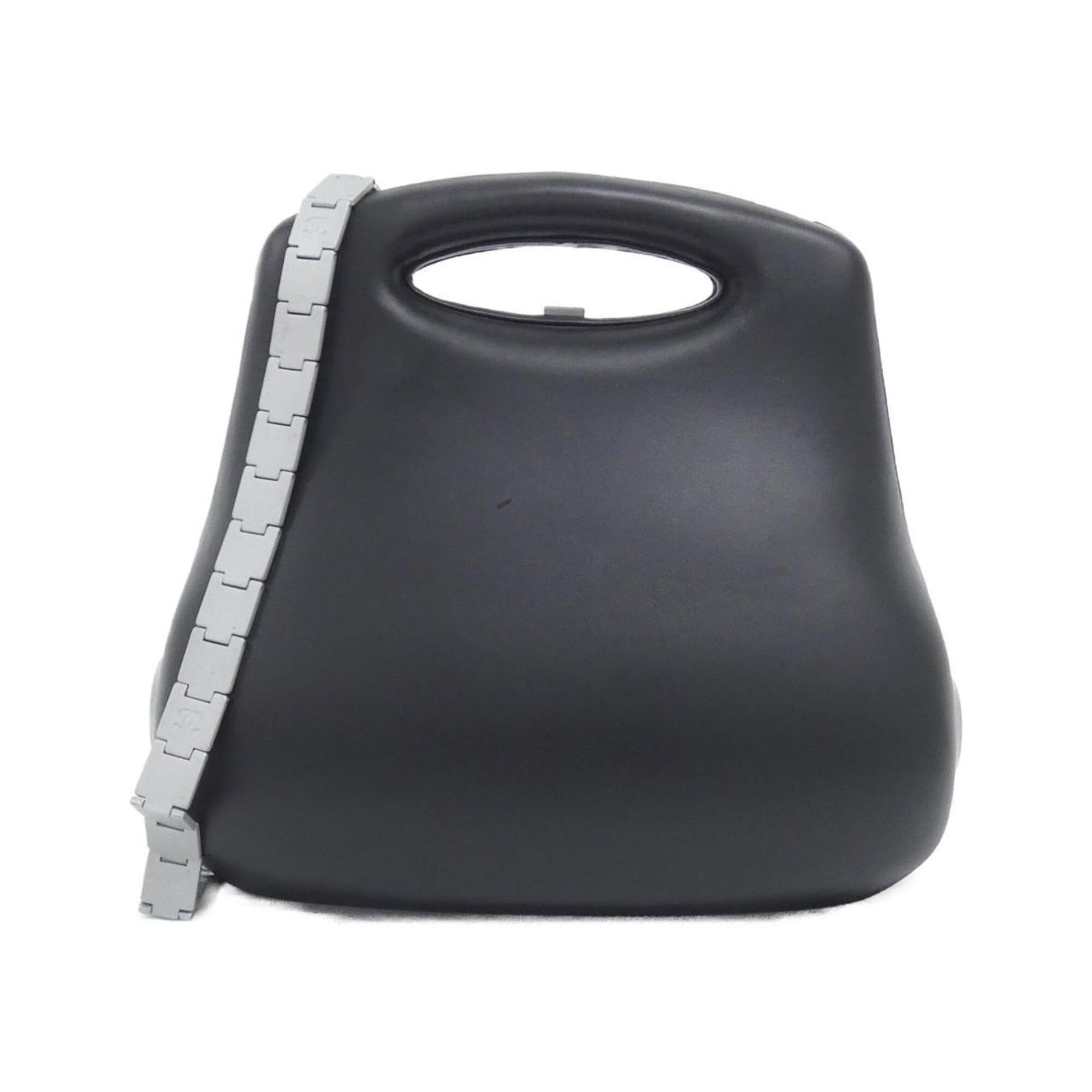 Handbag Leather from Chanel: Handbag Leather from Chanel This black Chanel handbag features genuine leather made from calfskin, with a classic design and timeless style. The bag's sleek dimensions and sturdy construction make it