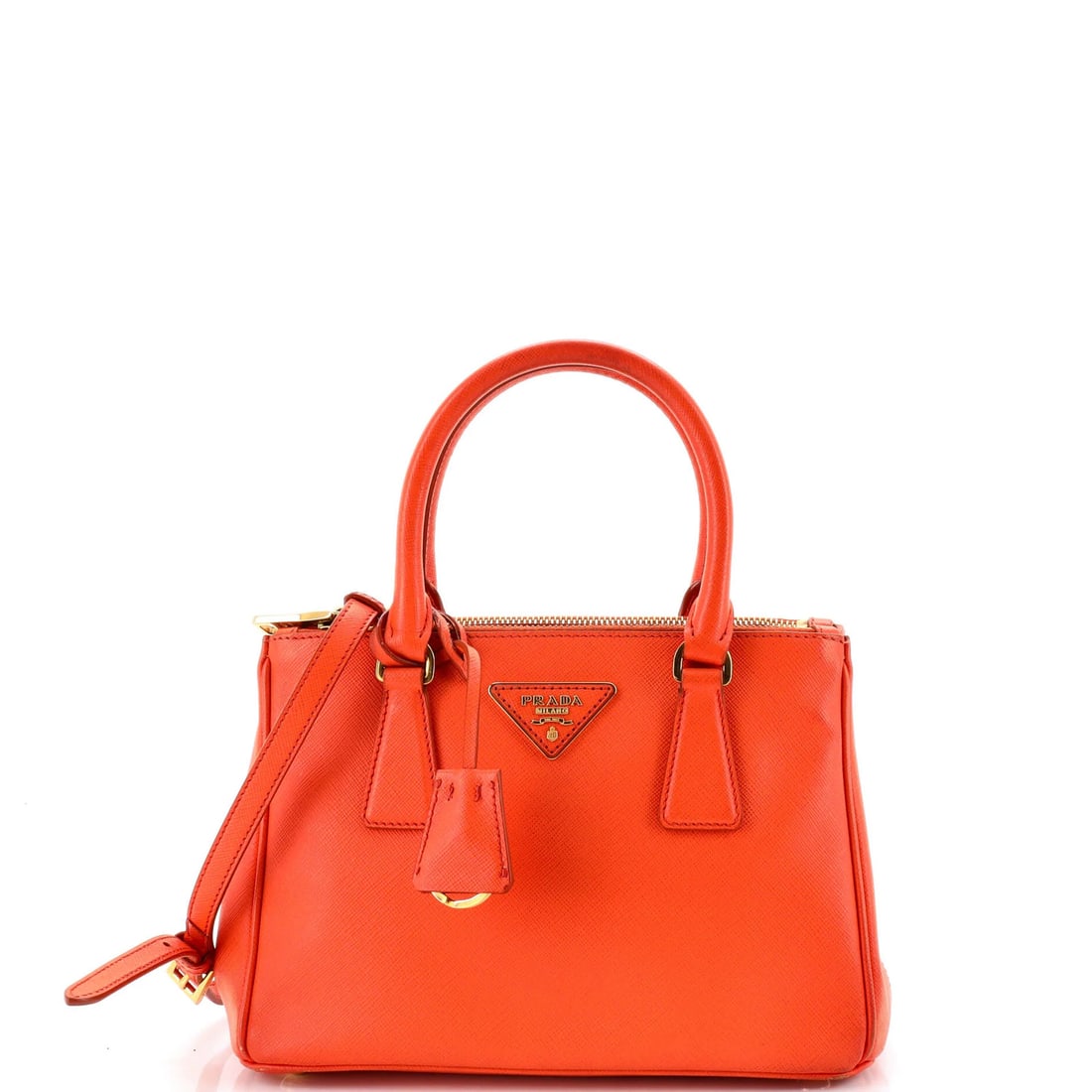 Prada Double Zip Lux Tote Saffiano Leather Small: Prada Double Zip Lux Tote Saffiano Leather Small The Prada Double Zip Lux Tote Saffiano Leather Small features a vibrant orange exterior with heavy scuffs, discoloration, and cracking, showcasing a