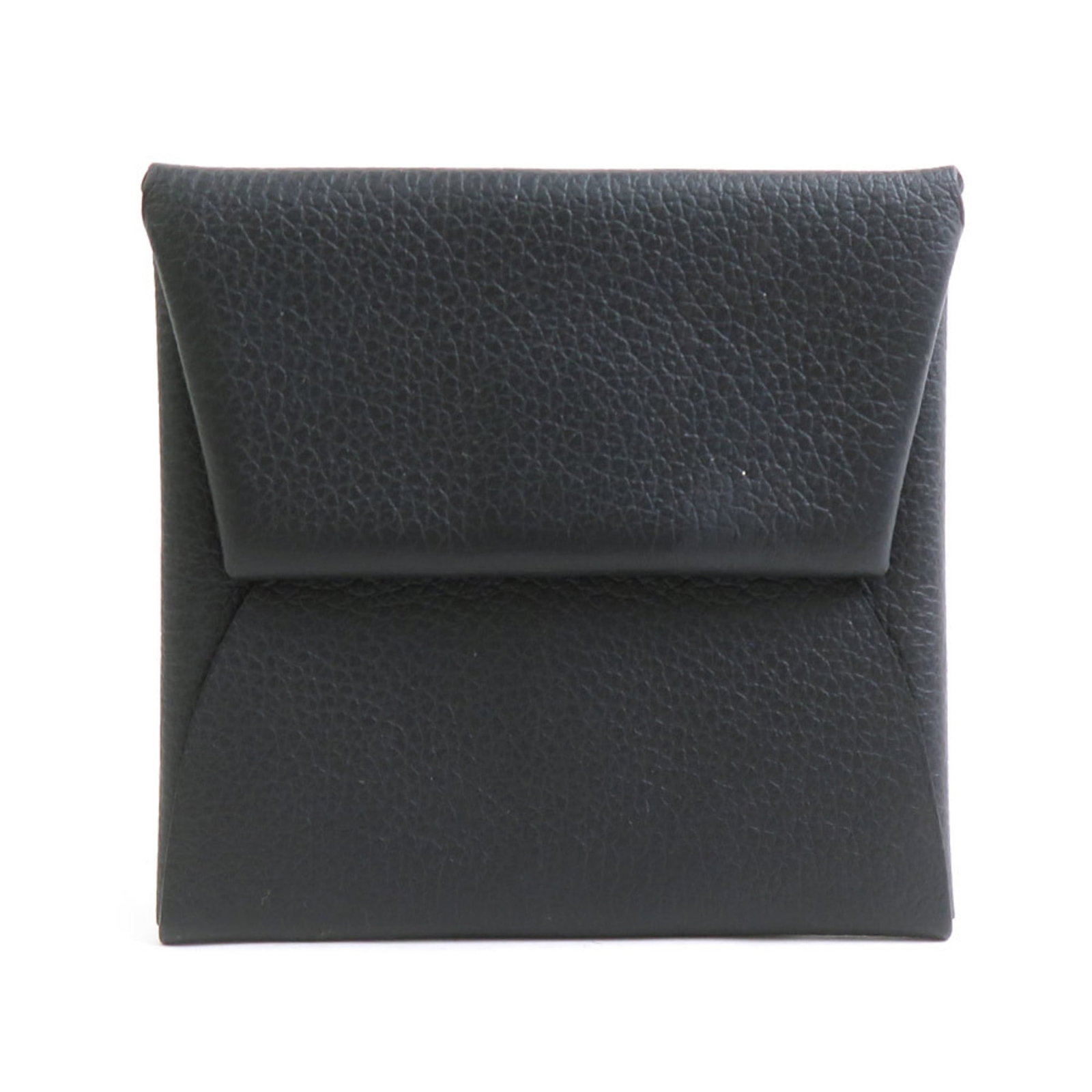 Hermes Coin Evercalf Leather Purse: Hermes Coin Evercalf Leather Purse Evercalf leather craftsmanship shines in this sleek, black Coin purse from Hermes, featuring a compact 8cm x 8.2cm size. Made from high-quality Evercalf leather,