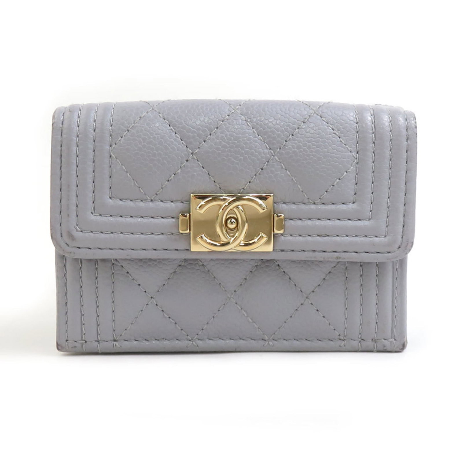 Chanel Wallet (Tri-Fold) Grained Calfskin: Chanel Wallet (Tri-Fold) Grained Calfskin The Chanel Wallet (Tri-Fold) Grained Calfskin is a classic, elegant accessory crafted from high-quality grained calfskin. Its light gray color and sleek