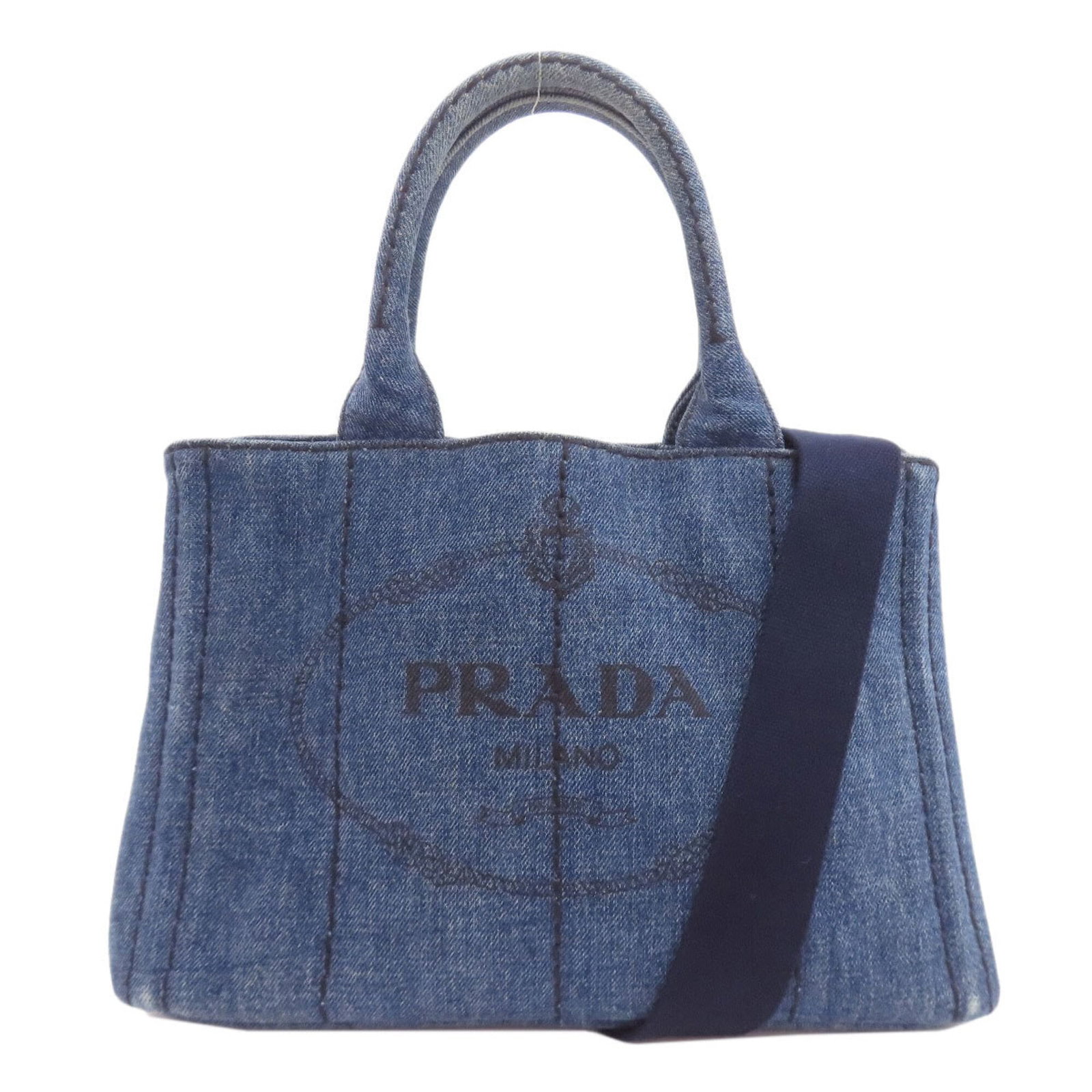 Handbag Denim Prada: Handbag Denim Prada Prada's denim handbag boasts a striking blue hue and a unique material that sets it apart from traditional leather bags. With its distinctive size and proportions, this bag is sure