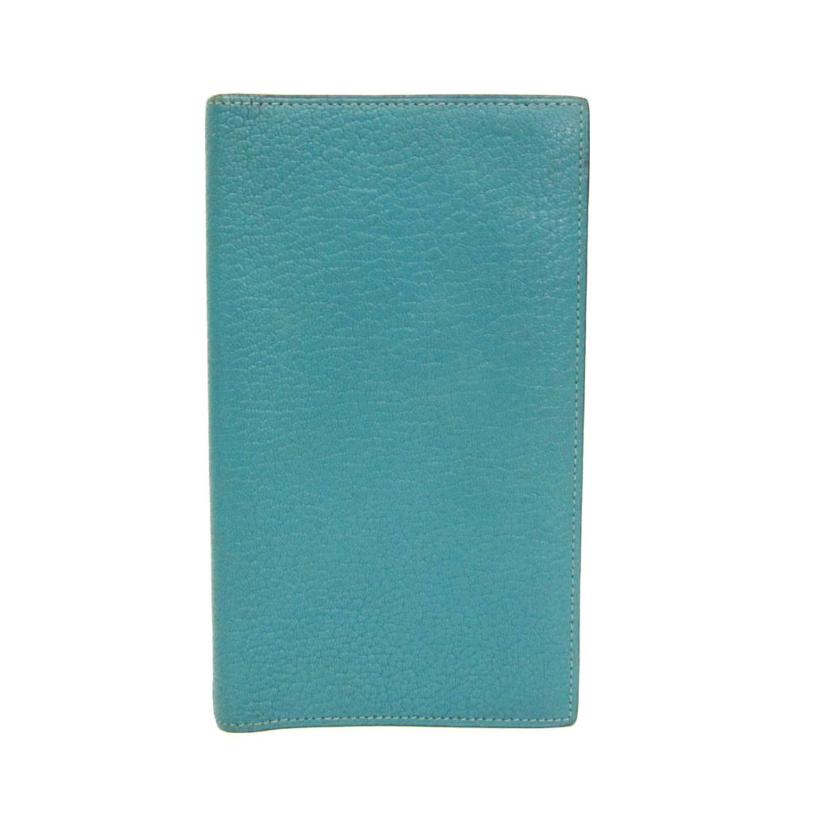 Vision Hermes Light Green Agenda Planner Blue A6: Vision Hermes Light Green Agenda Planner Blue A6 Chevre leather wraps a light blue-green A6 agenda, crafted in France by Hermes. This compact planner measures 17cm x 10cm x 1cm and weighs 90g, making 