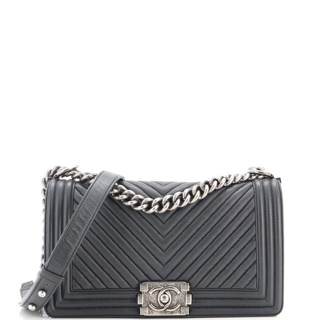 Wrinkled Lambskin Old Medium Chevron Flap Bag Boy: Wrinkled Lambskin Old Medium Chevron Flap Bag Boy The Wrinkled Lambskin Old Medium Chevron Flap Bag Boy boasts a unique, distressed exterior in a beautiful blue hue, adding a touch of edginess to its 