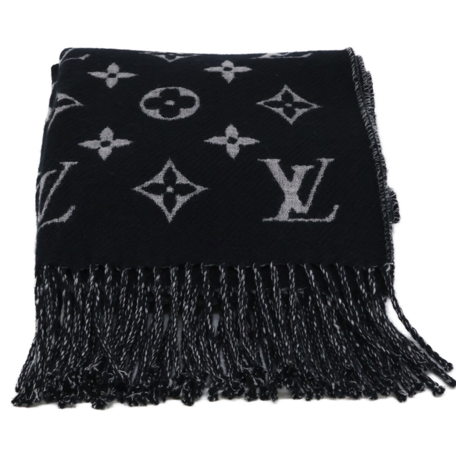 Louis Vuitton Stole Wool: Louis Vuitton Stole Wool Louis Vuitton Steeple Wool measures 2.2m x 47cm, with a striking black and gray color palette. The item's wool material and substantial size make it a notable piece, standing
