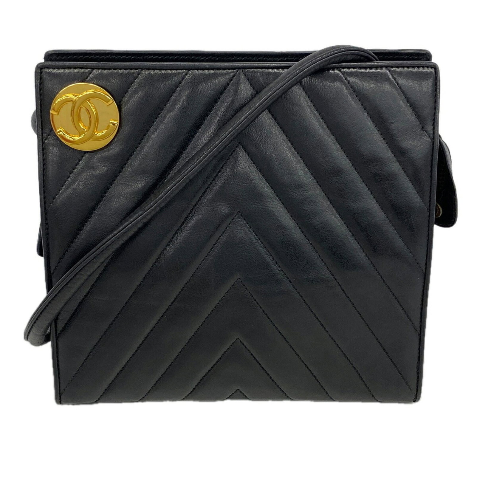 Shoulder Bag Leather Chanel: Shoulder Bag Leather Chanel Black lambskin shoulder bag from Chanel, featuring gold hardware and a classic design. Made from high-quality leather, this timeless piece is a staple for any fashion